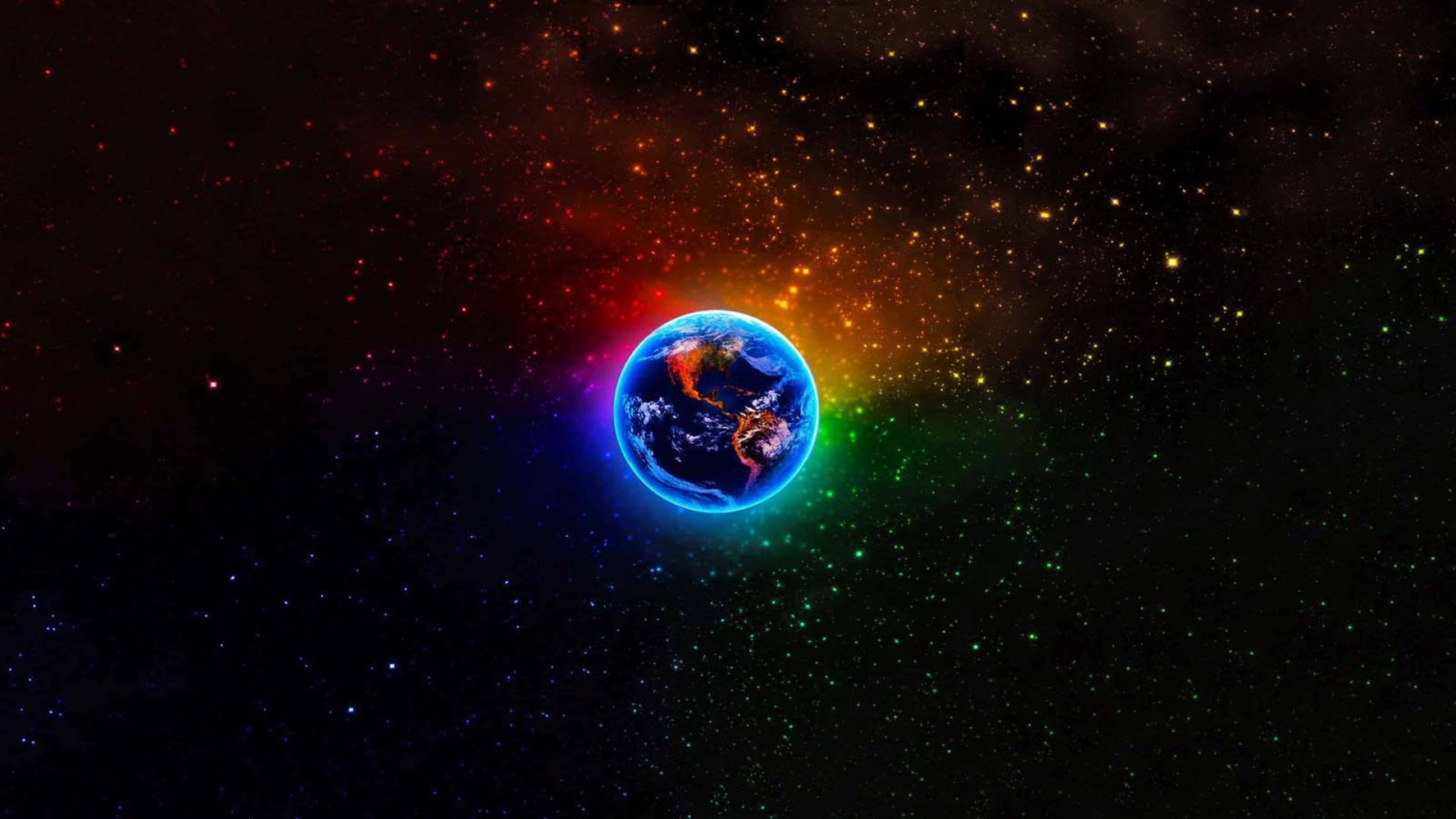 4K 宇宙：多彩地球 壁紙 — 地球散發著鮮豔的彩虹光環，背景是佈滿星星和彩色星雲的宇宙。