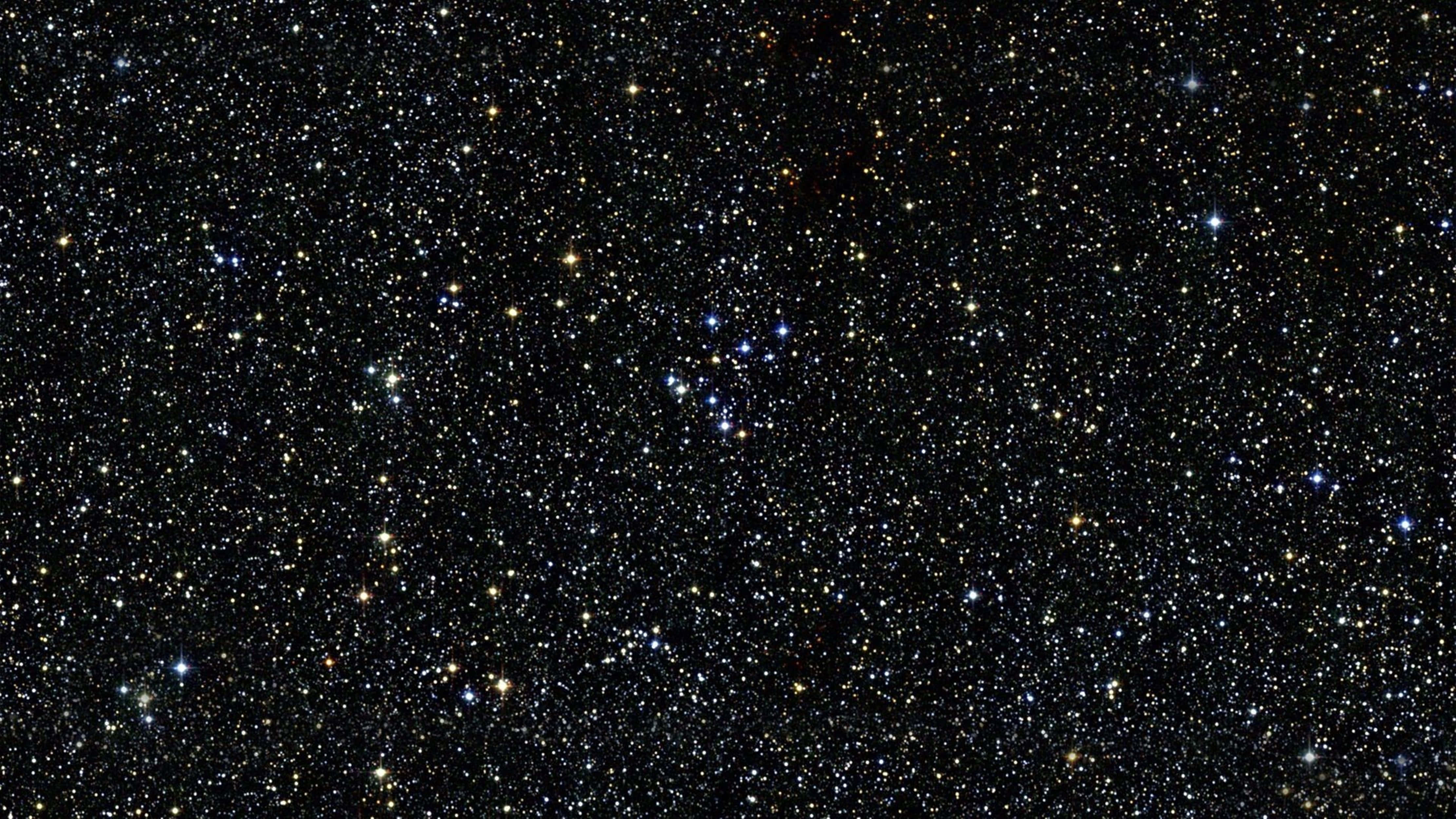 4K 宇宙：繁星點點 壁紙 — 無數星星在深邃的太空黑暗中閃爍的壯麗景色。