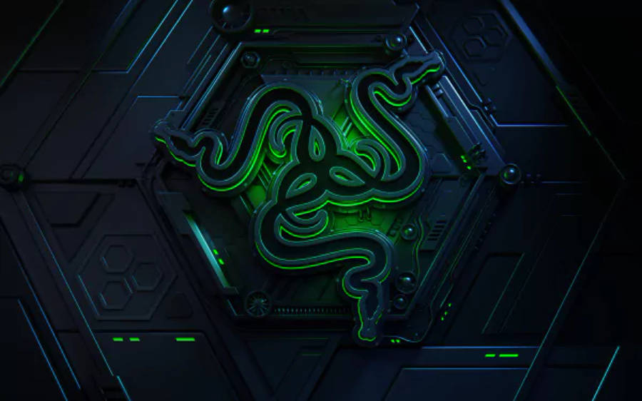 雷蛇引擎 4K 壁紙 — 發光綠色Razer標誌嵌入在帶有霓虹色調的黑暗未來六邊形科技面板中。