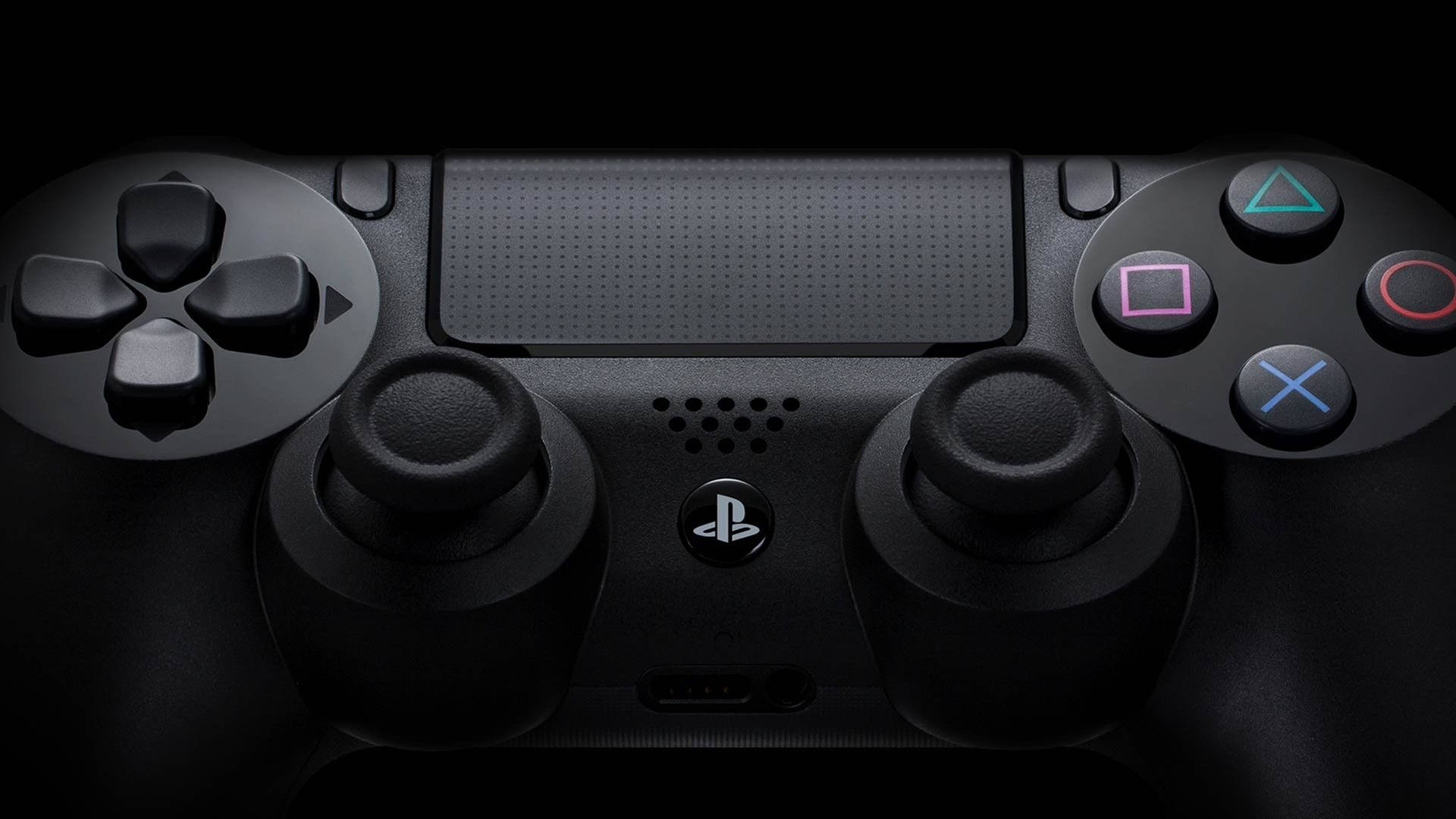 黑色PlayStation手掣，在黑暗環境中帶有發光按鈕。