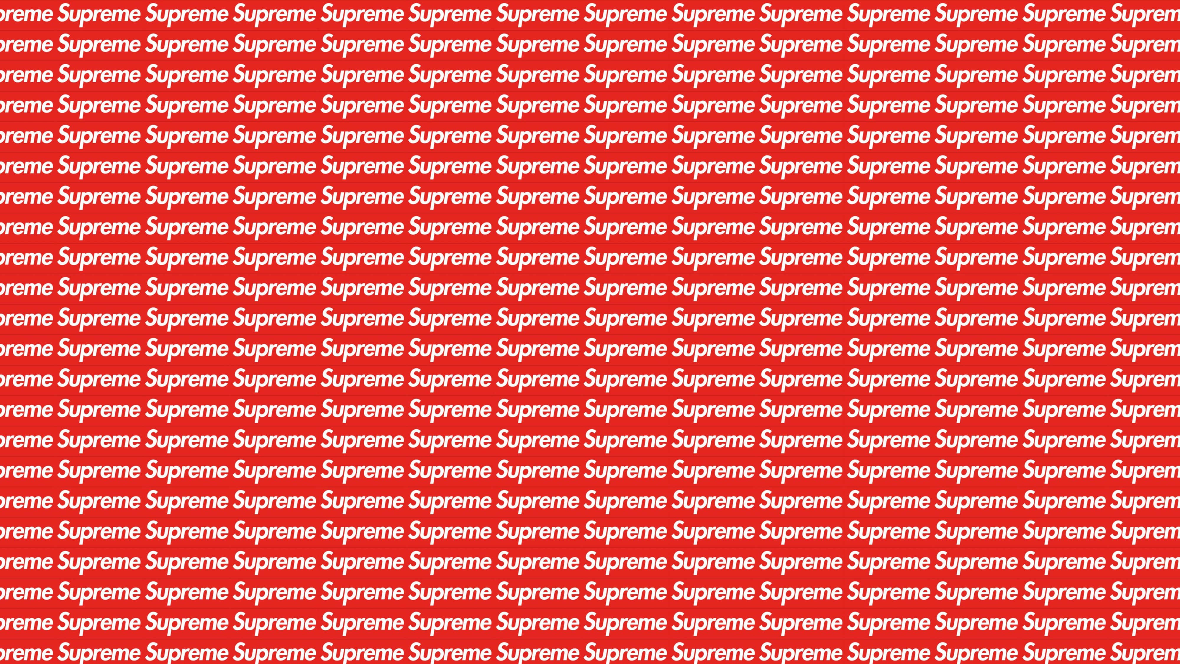 4K Supreme 極致圖案設計 壁紙 — 一個大膽的紅色背景，充滿重複的白色「Supreme」文字，形成網格圖案。
