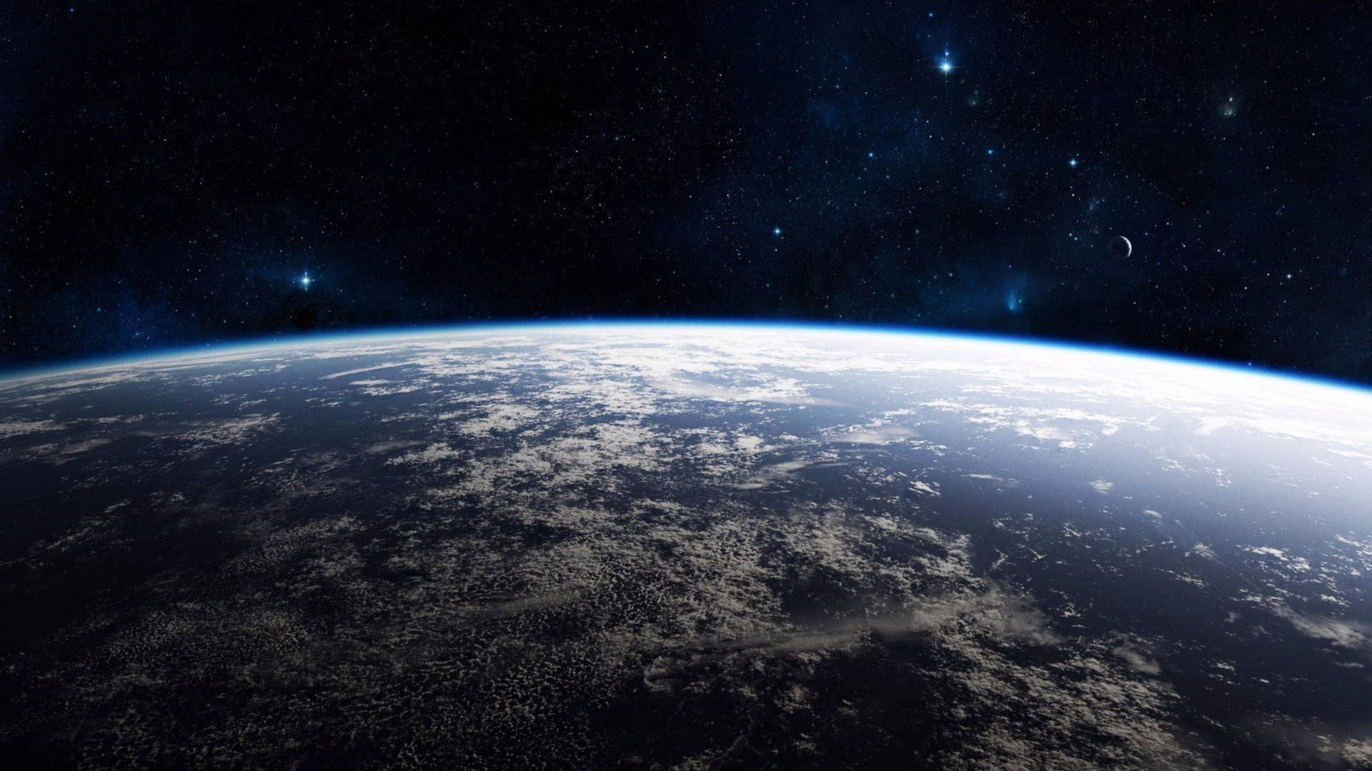 從軌道上看到的地球，黑暗的天空中有雲和星星。