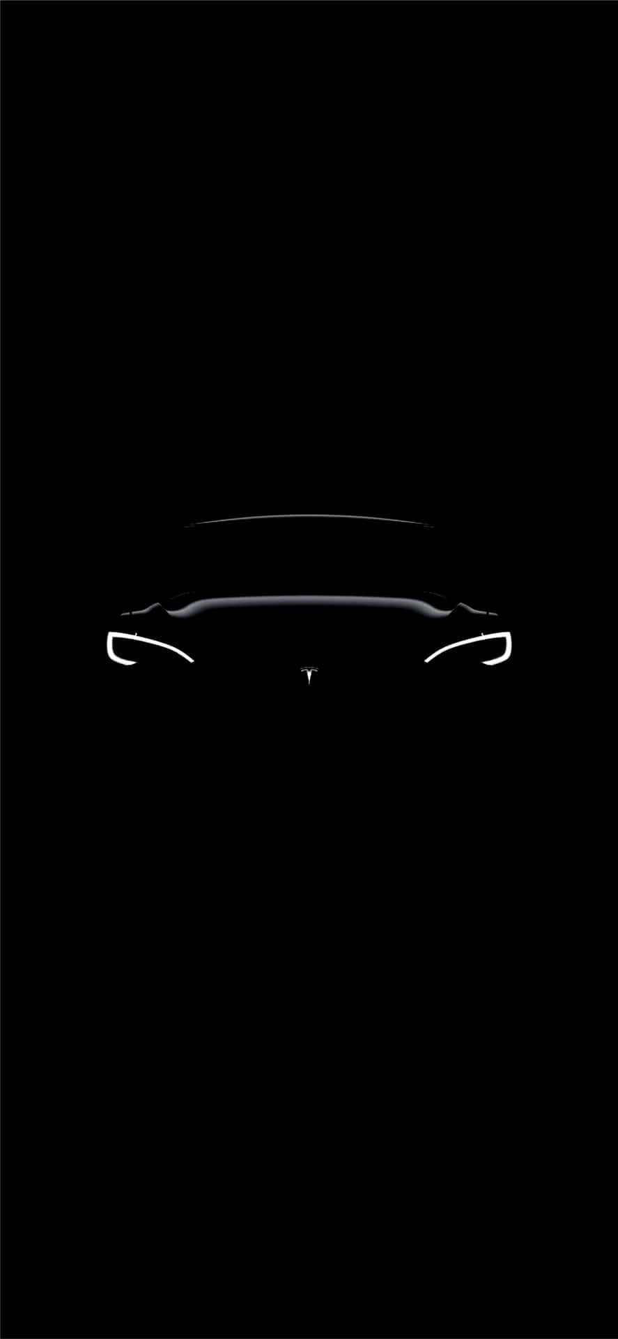 黑色背景上Tesla汽車前部輪廓帶發光車頭燈