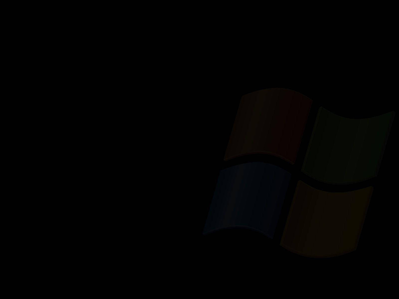 Windows 標誌在深色背景上柔和發光。