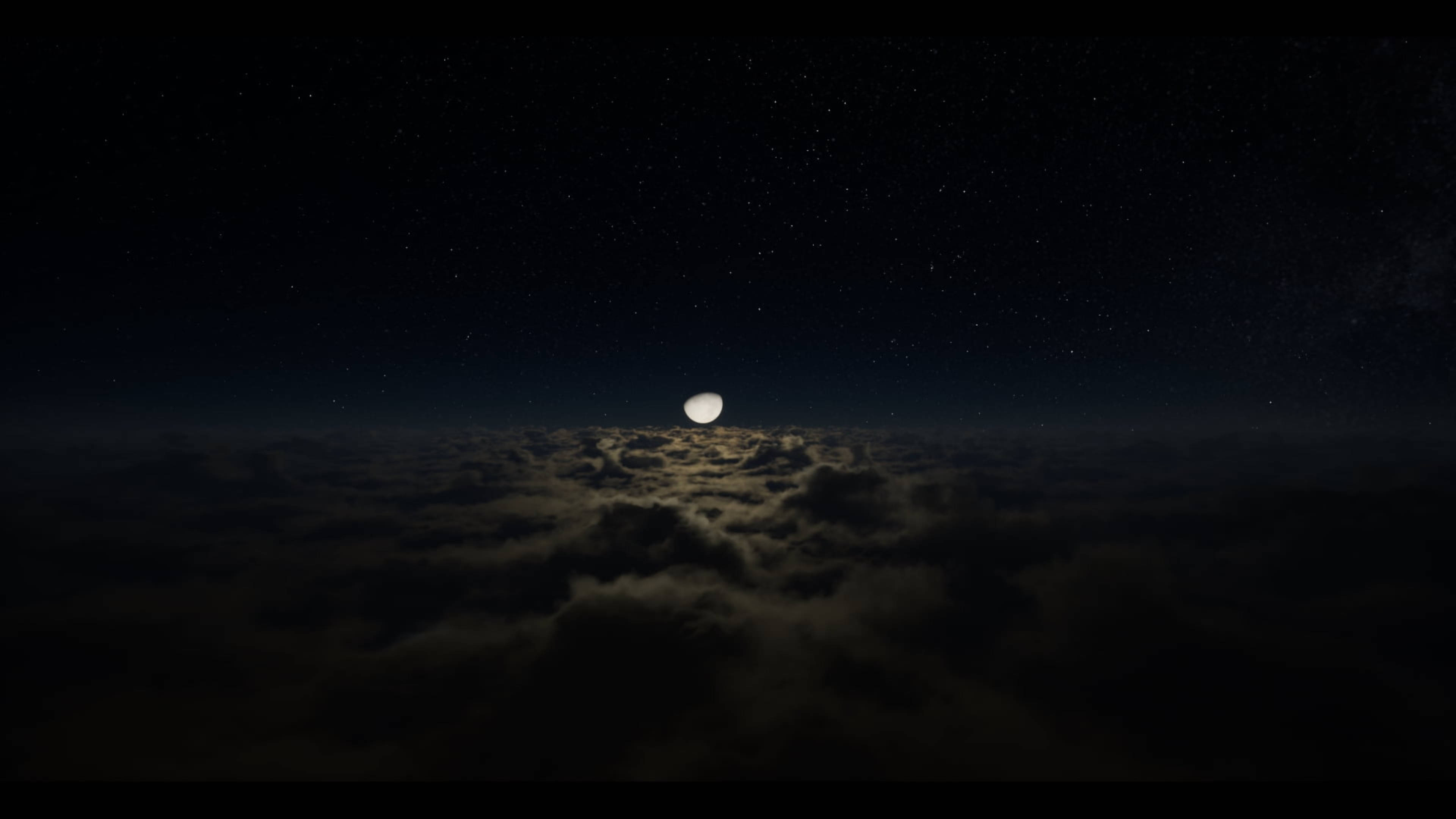 4K筆電 月升雲海 壁紙 — 一輪明亮的月亮在星夜下的雲海上發光。