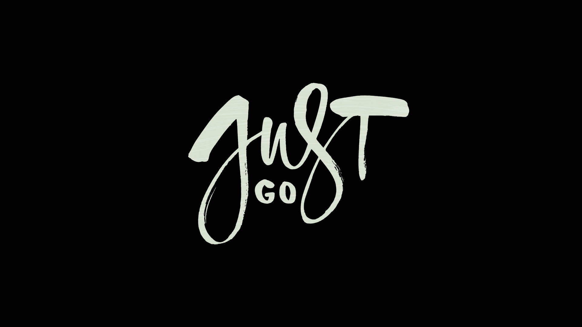 黑色背景上白色書法文字寫著 just go