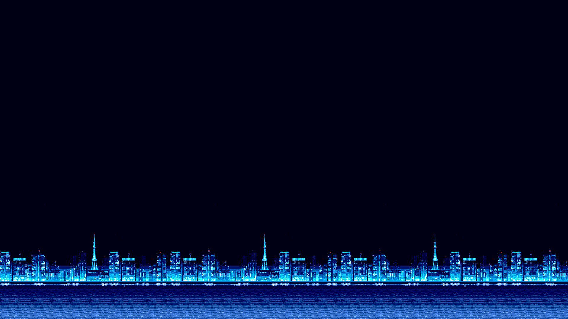 夜晚藍色燈光城市天際線倒映在水中