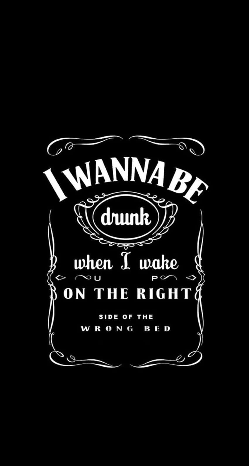  壁紙 — 黑色背景上，白色文字以威士忌標籤風格呈現，內容為「I WANNA BE drunk when I wake ON THE RIGHT SIDE OF THE WRONG BED」。