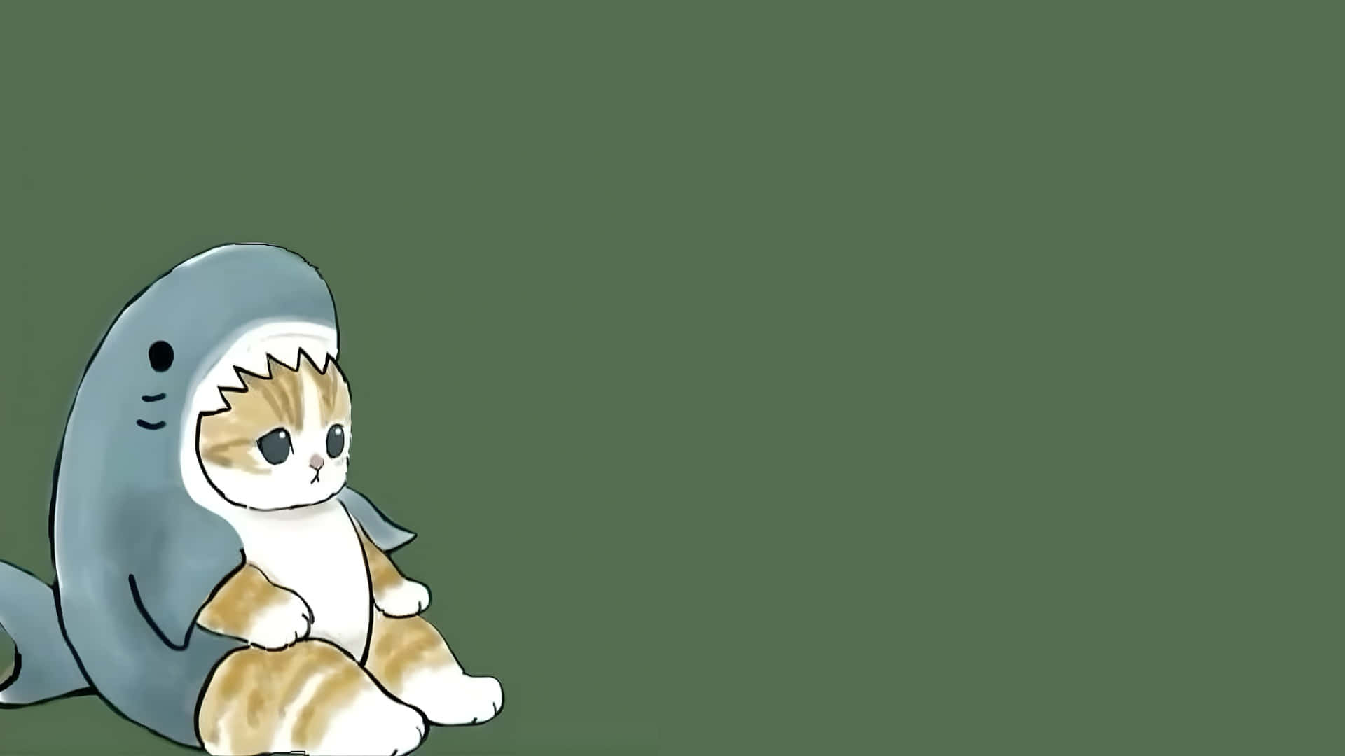  壁紙 — 一隻可愛的卡通小貓穿著鯊魚服裝，獨自坐在純綠色背景前。