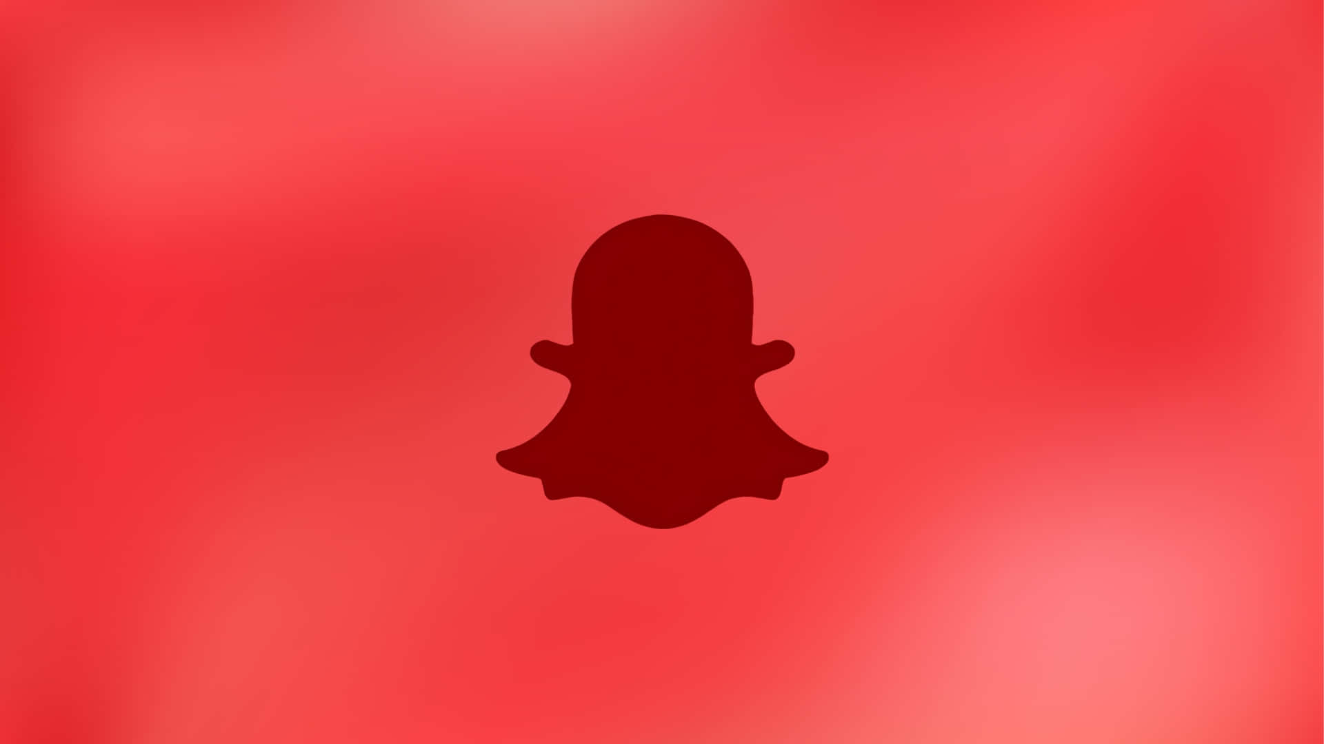  壁紙 — 深紅色Snapchat鬼魂標誌居中於漸變紅色背景上。