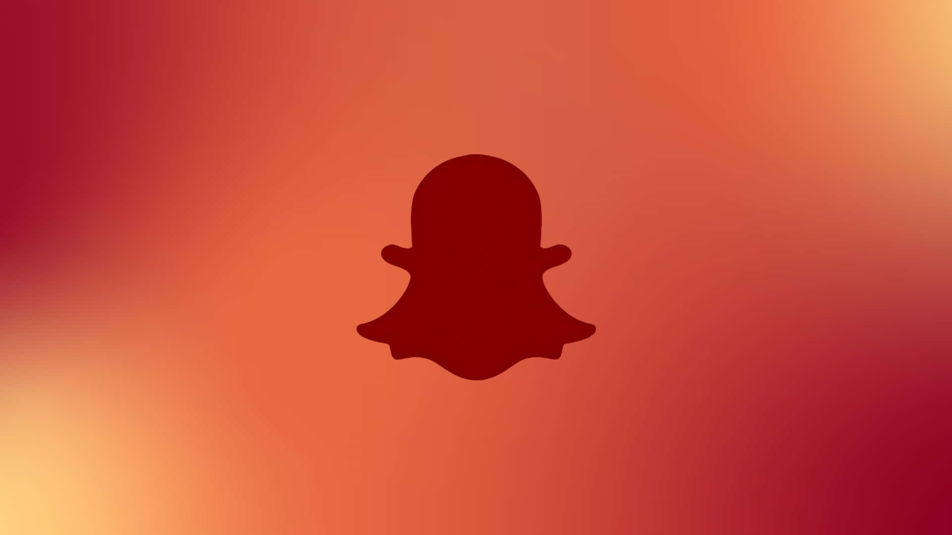  壁紙 — 一個深紅色的Snapchat鬼魂標誌，居中於橙色和紅色色調的溫暖漸變背景上。