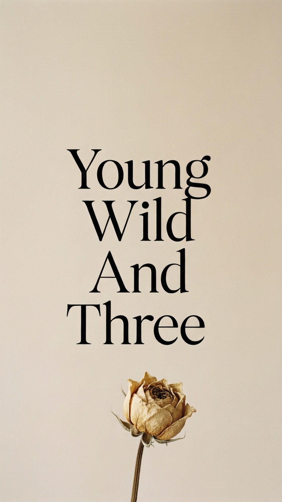米色背景上帶有文字 Young Wild And Three 的乾燥玫瑰