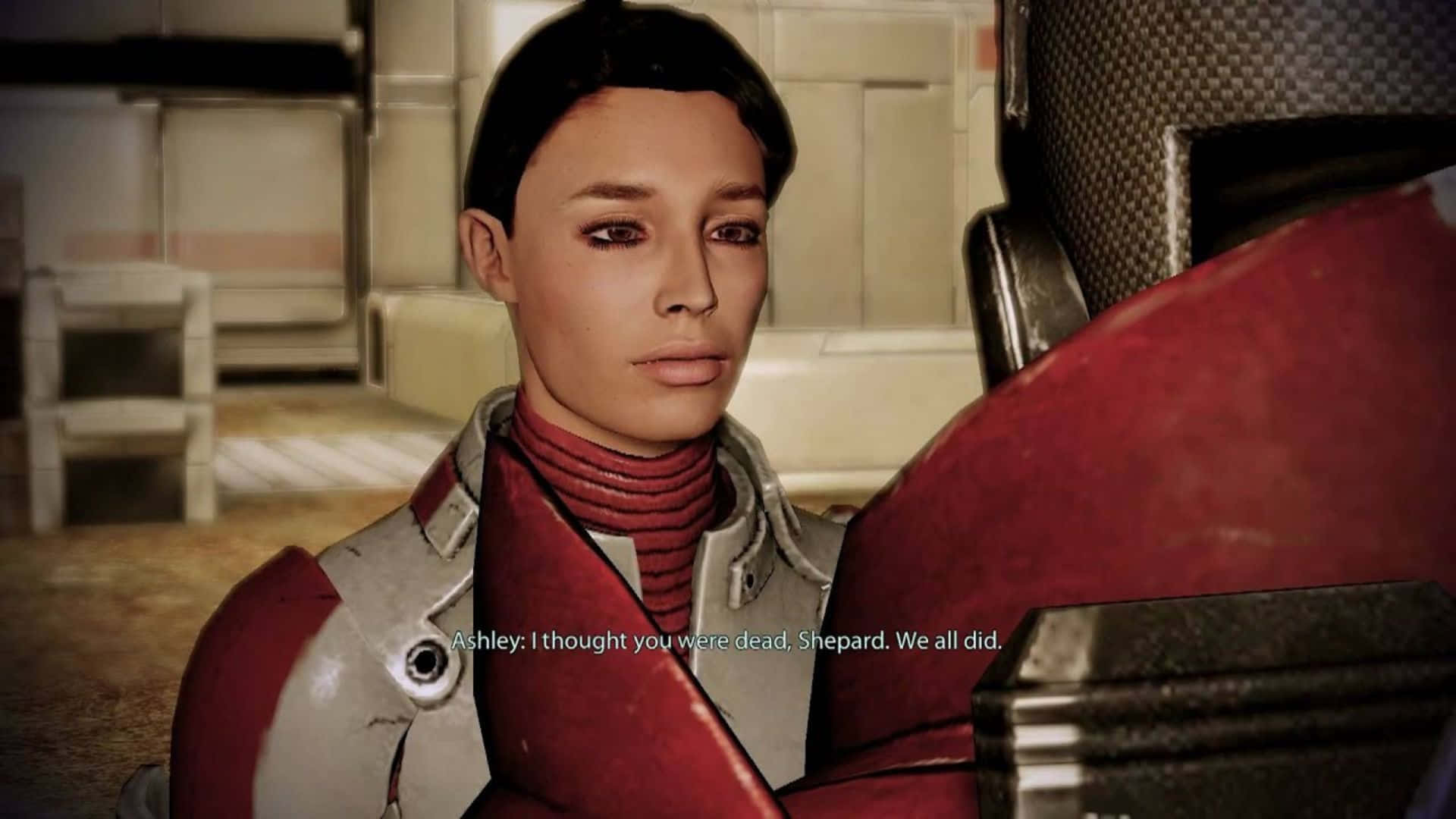 Ashley Williams 桌布 壁紙 — 一位身穿紅灰色盔甲的女戰士在昏暗的未來風格房間中莊嚴地向前凝視。