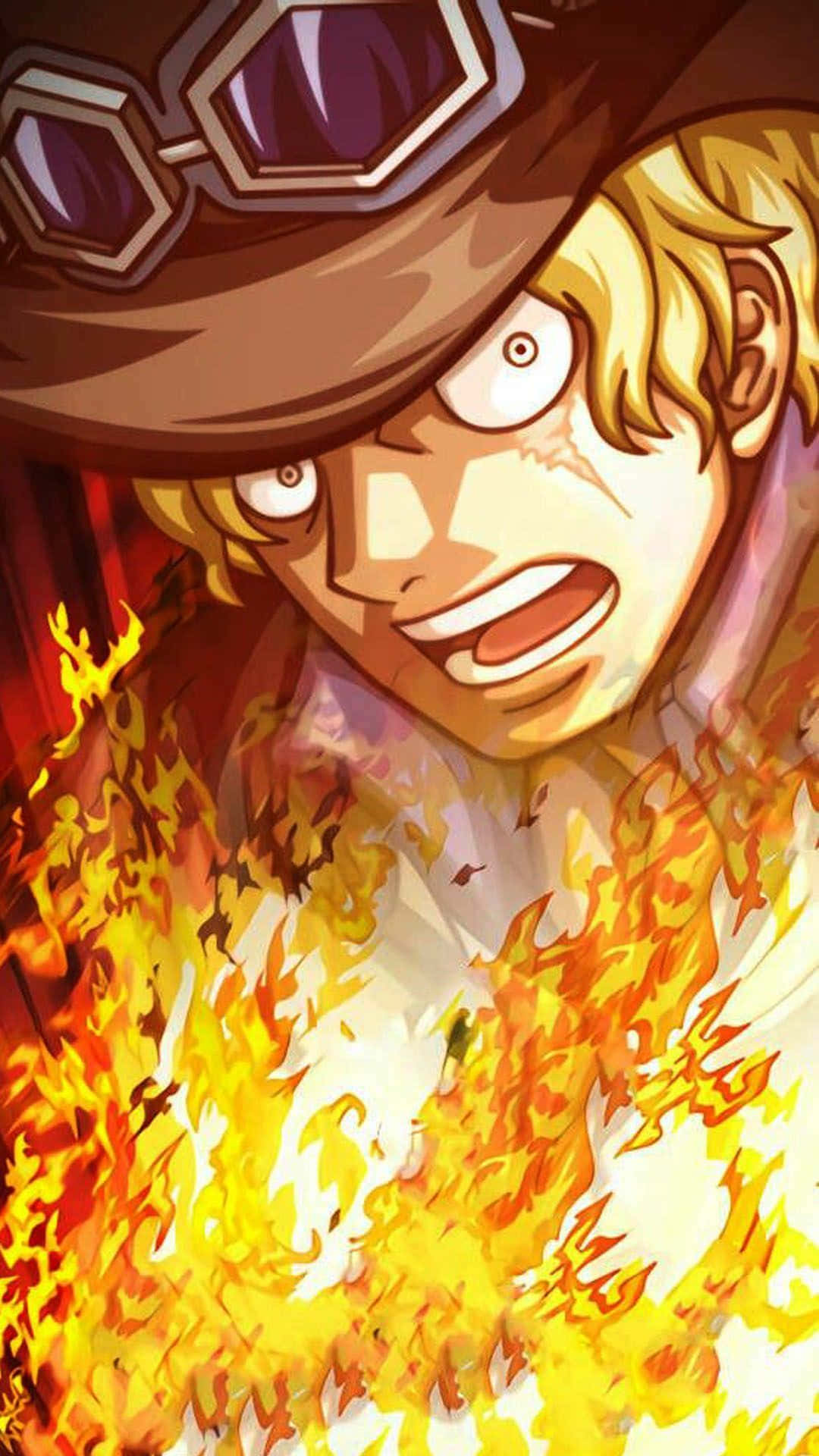 Sabo 桌布 壁紙 — 一個火熱的動漫角色，金髮護目鏡，在熊熊烈火中猛烈咆哮。