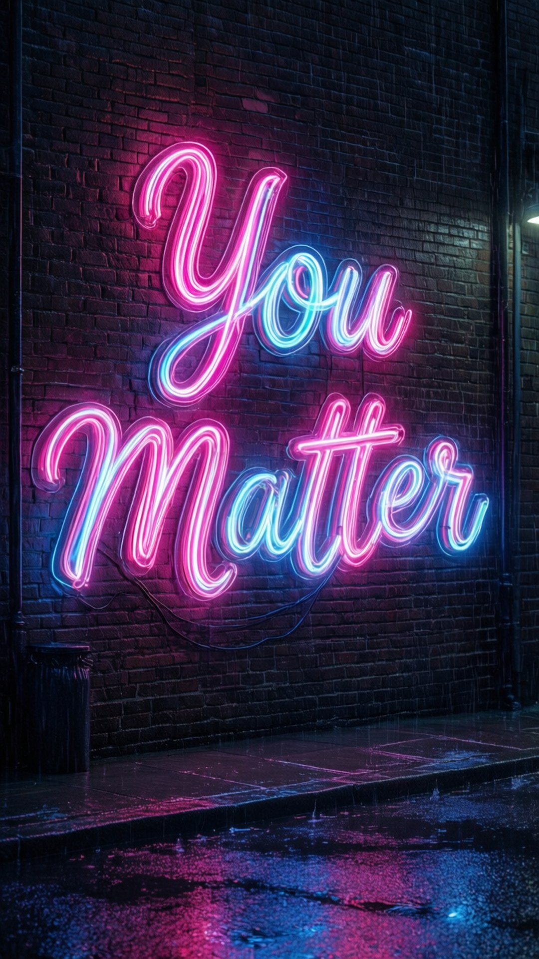 you matter 桌布 壁紙 — 一個發光的霓虹燈牌，上面用粉紅色和藍色寫着「You Matter」，在夜晚潮濕的城市人行道上投射出鮮豔的倒影。
