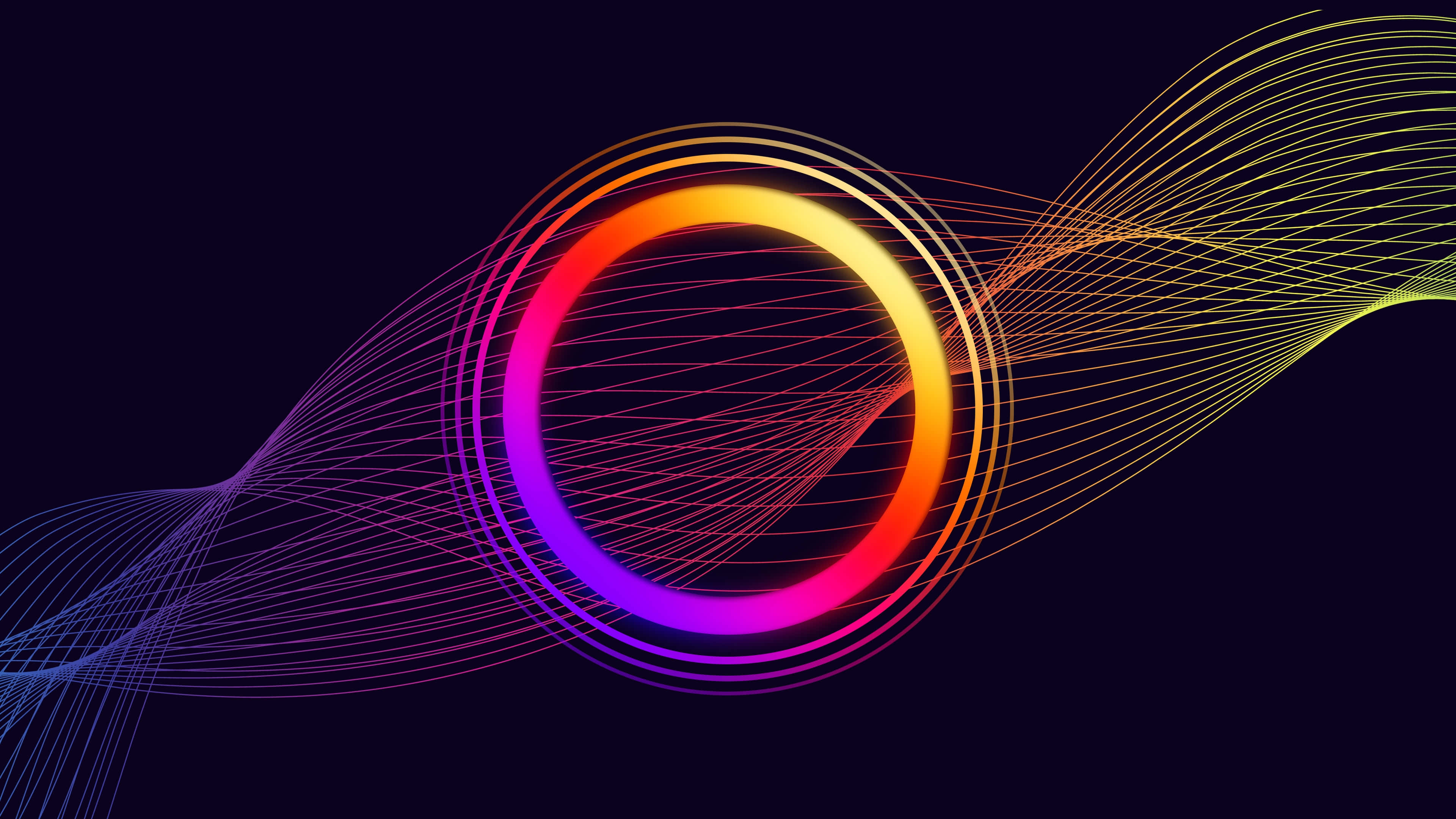 Abstract Circle 桌布 壁紙 — 一個發光的彩虹環隨著能量脈動，彩色線條在黑暗背景上動態流動。