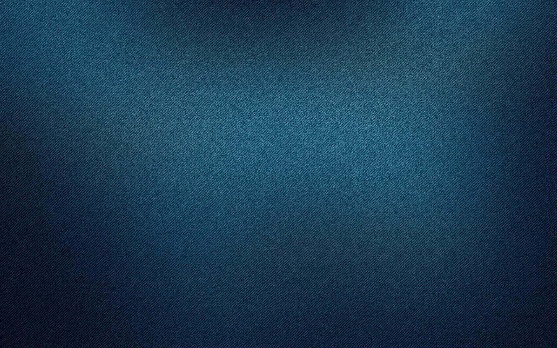 光滑的牛仔布紋理，帶有漸變藍色色調。
