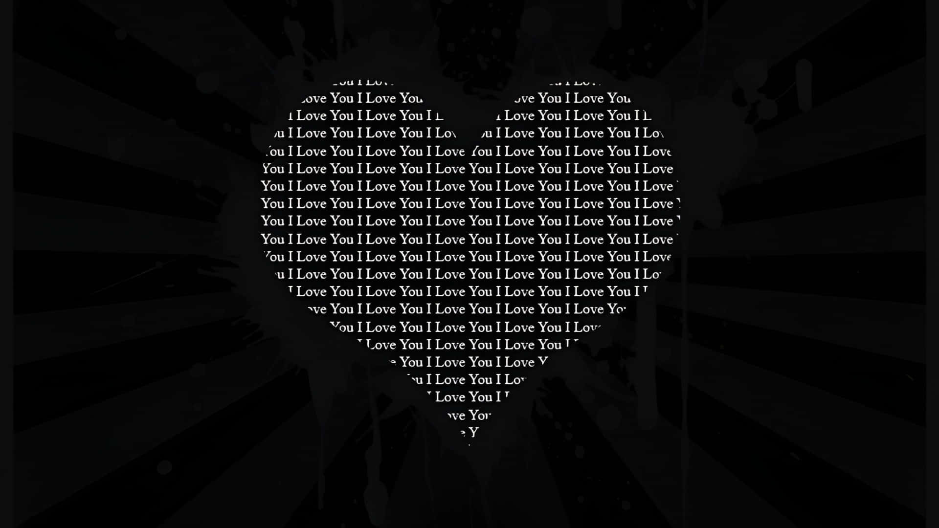  壁紙 — 一個心形文字圖案，由重複的白色「I Love You」短語在深色幾何背景上組成。