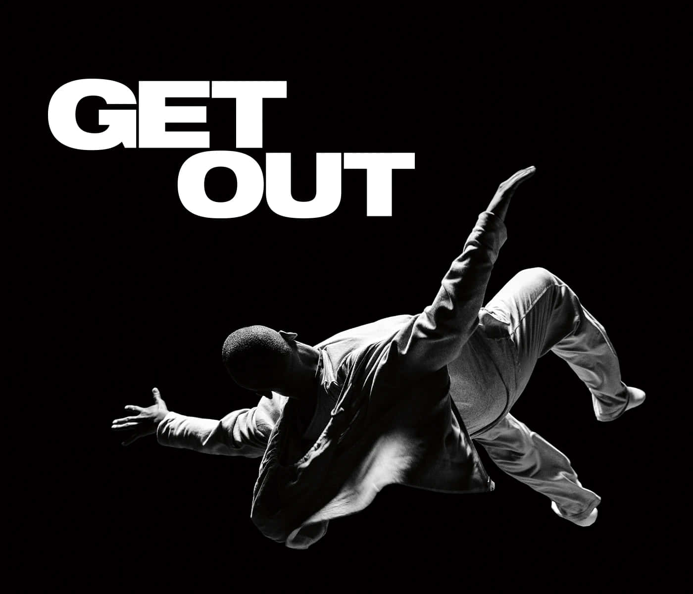  壁紙 — 一個男人在半空中，黑色背景上有粗體白色文字寫著 get out。