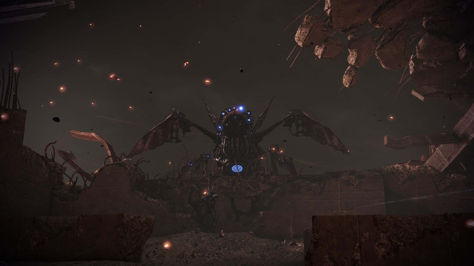 Mass Effect Legendary Edition 桌布 壁紙 — 一個巨大的生物機械昆蟲狀生物，擁有發光的藍色眼睛和翅膀，從黑暗天空下的廢墟石結構中出現。