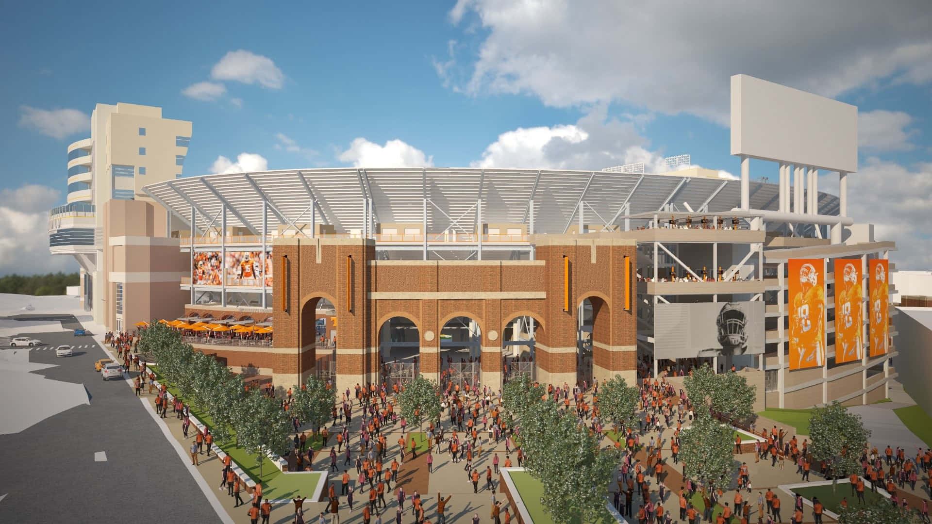  壁紙 — 一個現代化的體育場，擁有磚砌外牆和拱形入口，在部分多雲的天空下，擠滿了穿著橙色服裝的球迷。