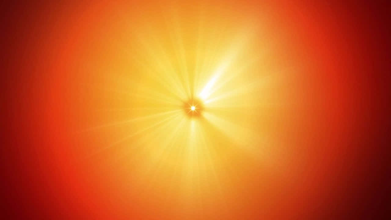  壁紙 — 一個燦爛的太陽爆發，金色光線從明亮的核心爆發，背景是火橙色和深紅色的漸變。