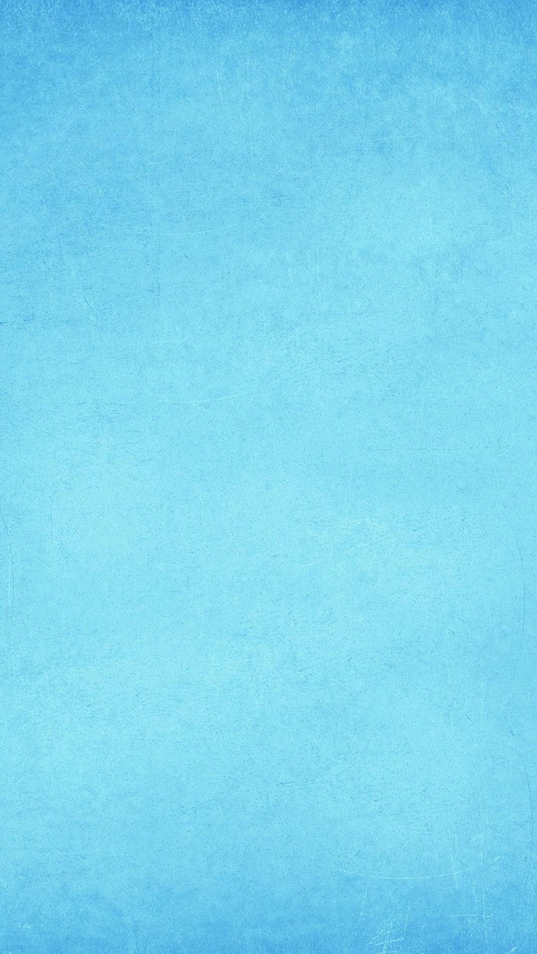 柔和藍色紋理背景，帶有柔和漸變和輕微刮痕。