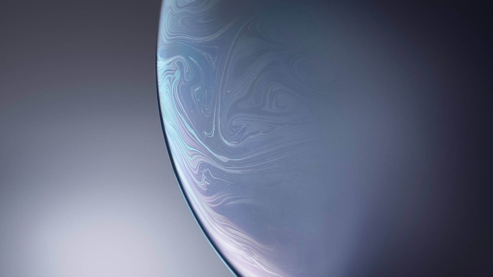 太空中一顆發光的藍白旋轉行星，帶有柔和的漸變背景。