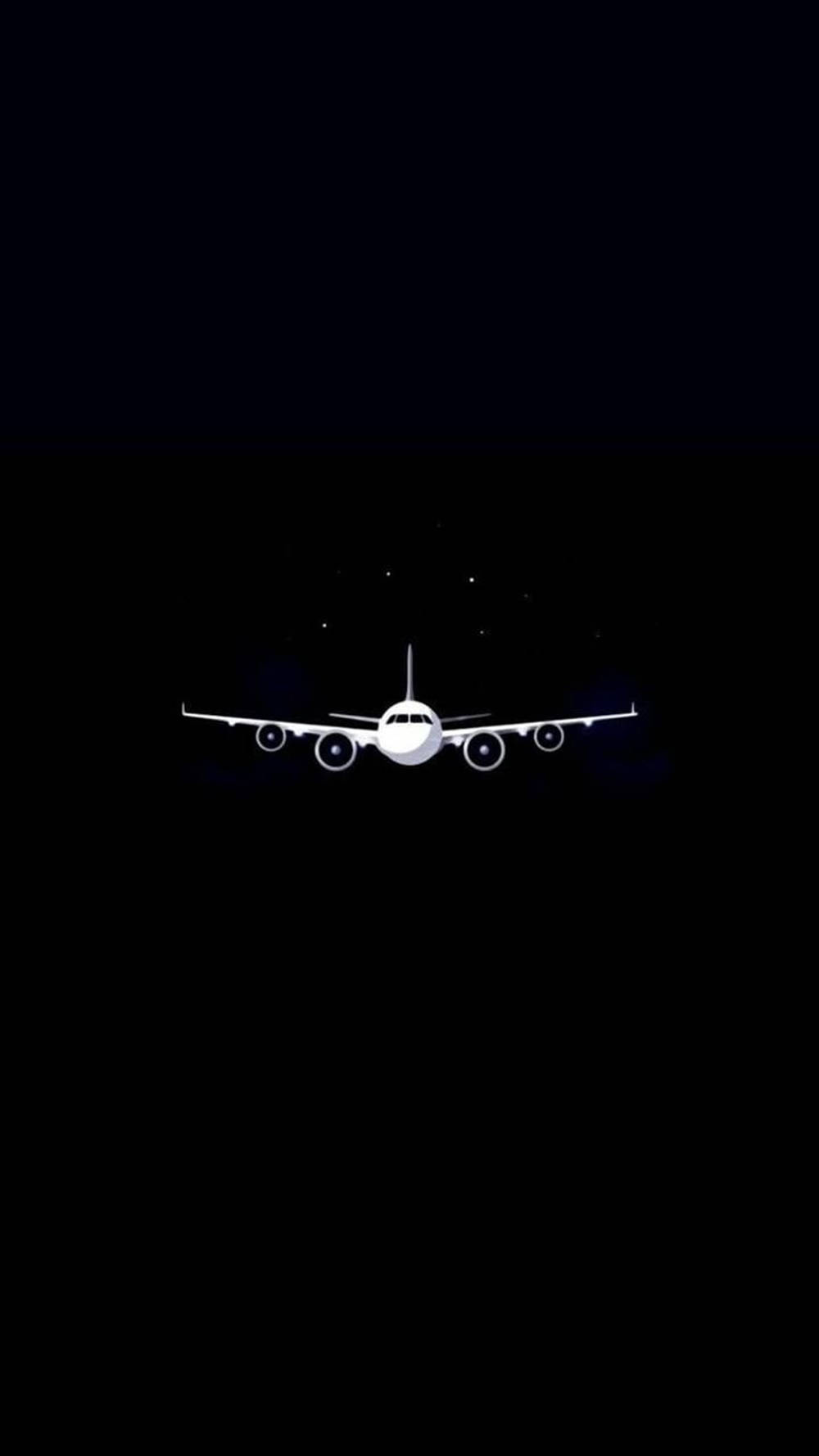 白色飛機在星夜黑色天空中飛行。