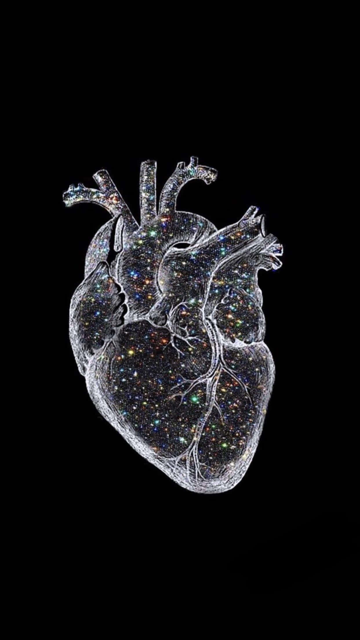 Medicina 桌布 壁紙 — 一個半透明嘅解剖學心臟，充滿閃爍星星，襯托黑色虛空。