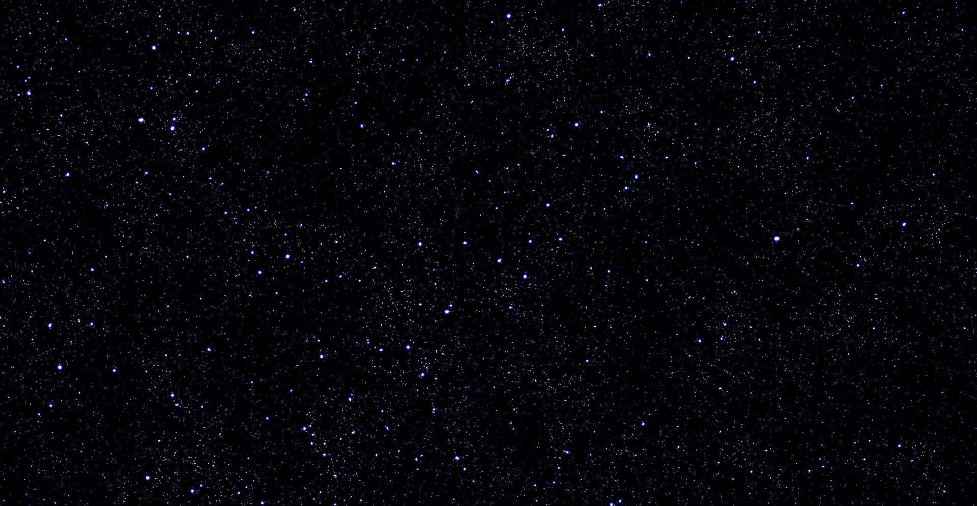 星空，無數閃爍的星星在黑暗背景上。