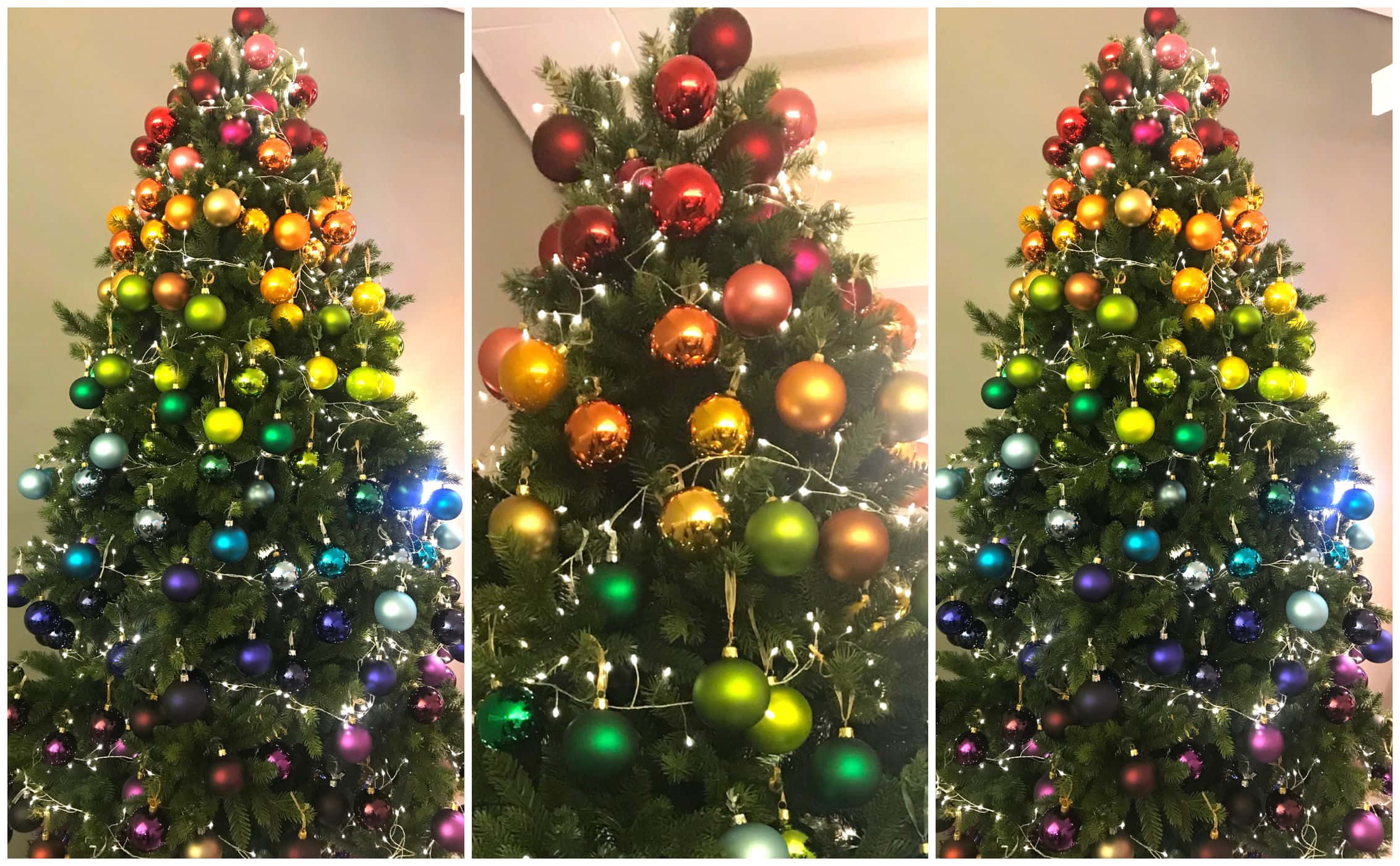 Christmas Rainbow 桌布 壁紙 — 一棵充滿活力的聖誕樹，在溫暖的室內環境中裝飾著色彩繽紛的金屬飾物和閃爍的仙女燈。