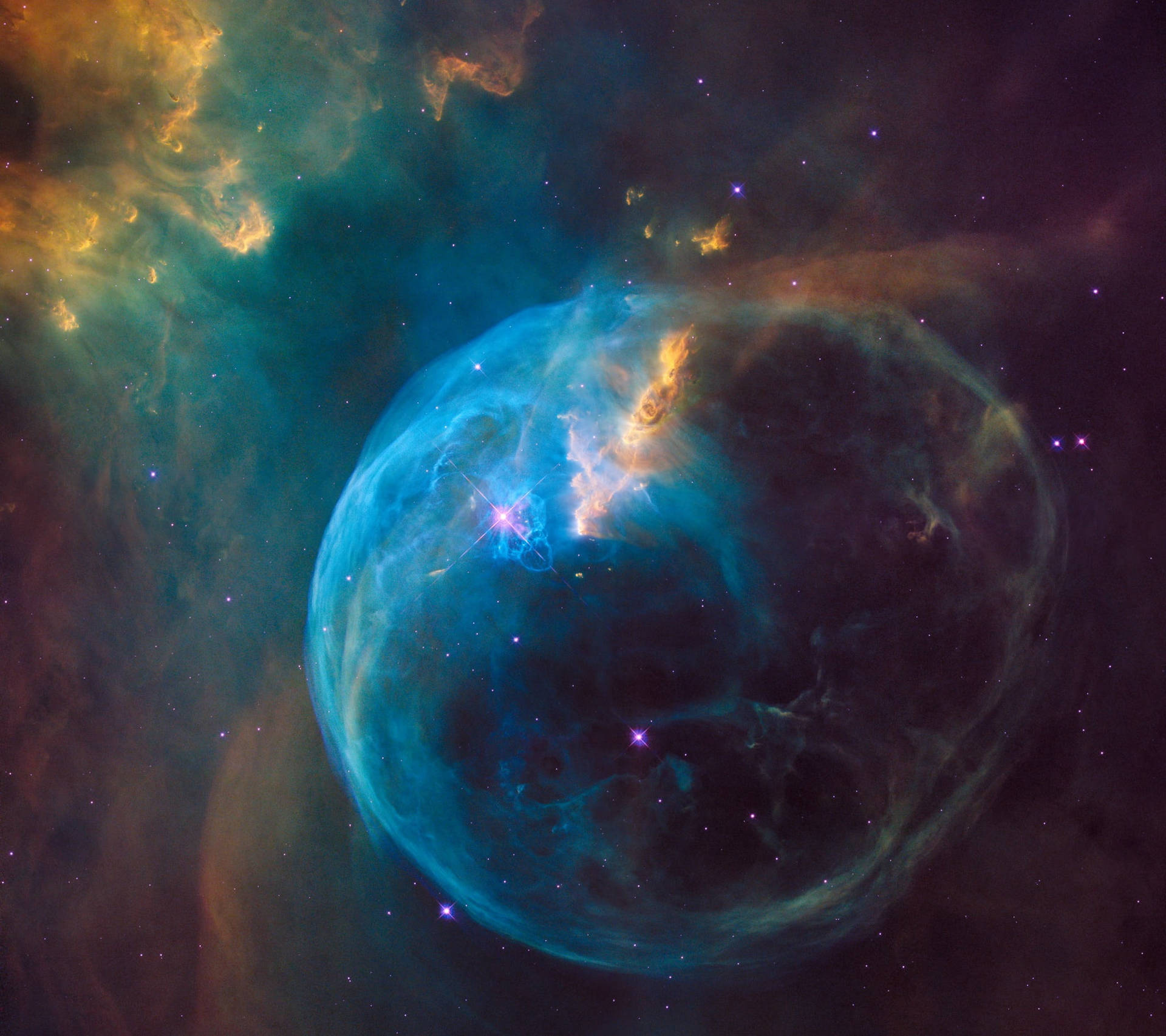 一個充滿星星的發光藍色和橙色宇宙泡泡星雲。
