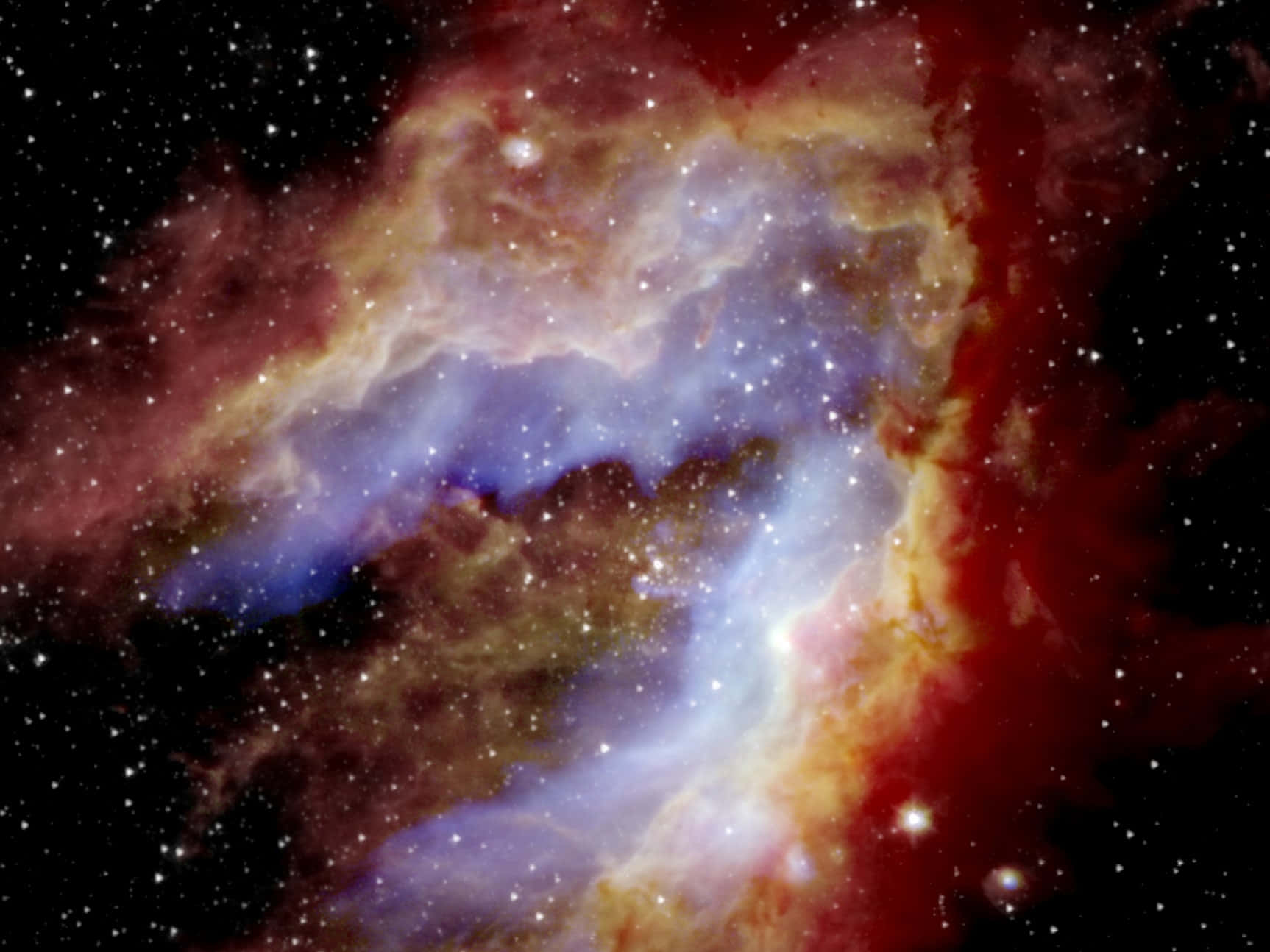 在深空中與星星一起發光的充滿活力的紅色、橙色和藍色星雲。
