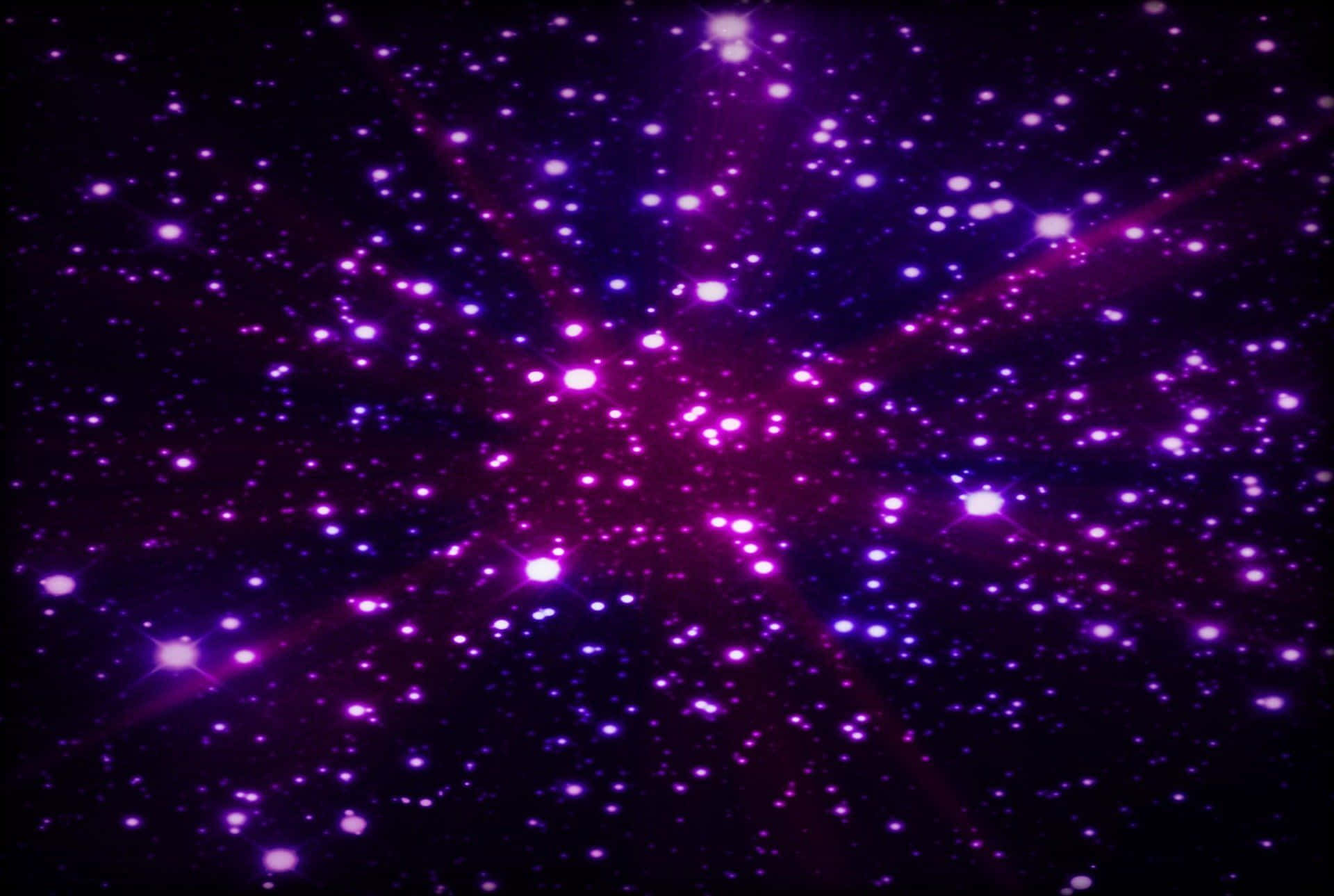 在宇宙夜空中閃耀的鮮豔紫色和粉紅色星星。