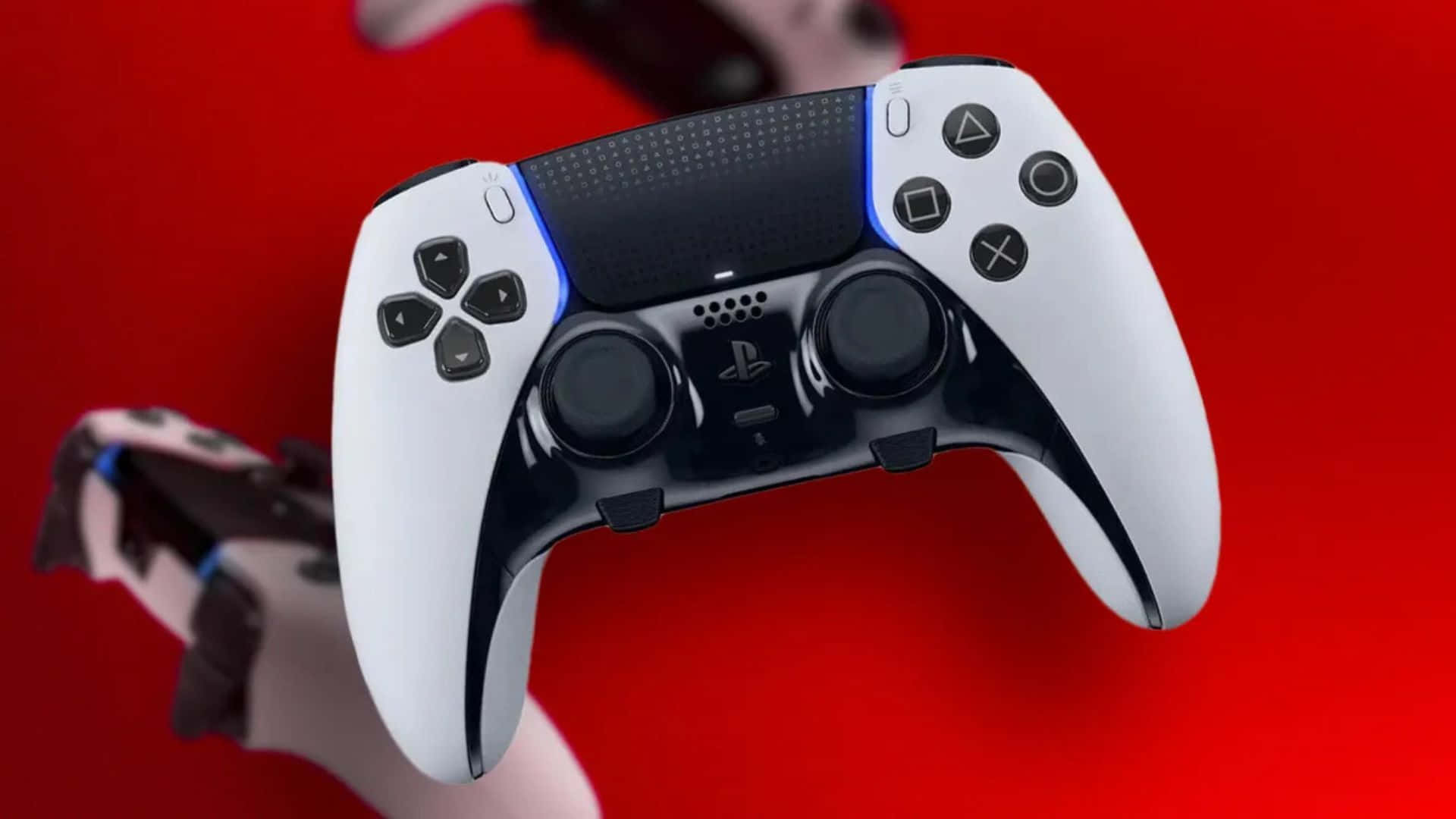  壁紙 — 一個白色和黑色的 PlayStation 5 DualSense 控制器漂浮在鮮豔的紅色背景上，帶有模糊的遊戲配件。