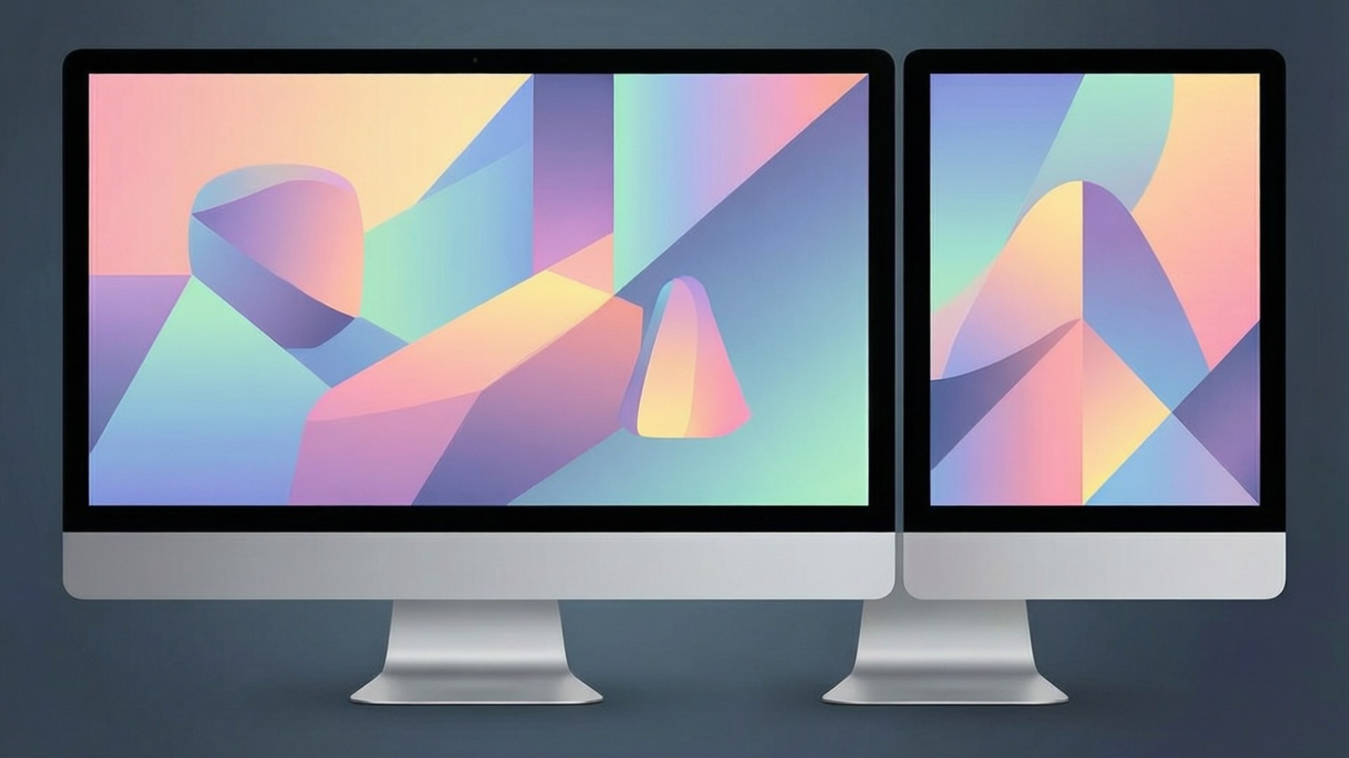 兩部 iMac 顯示帶有粉彩漸變的彩色抽象幾何壁紙。