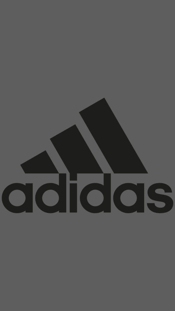 Adidas iPhone 標誌灰色背景 壁紙 — 極簡深灰色背景，標誌性黑色Adidas標誌居中突出顯示。