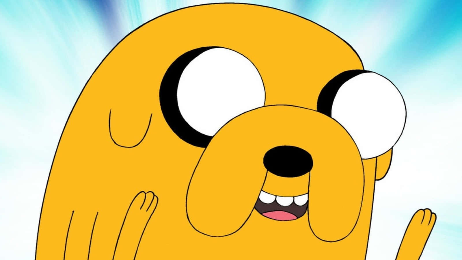 Adventure Time Jake 大白眼圖 壁紙 — 一隻快樂的黃色卡通狗，大眼睛和燦爛的笑容，背景是明亮的藍天。