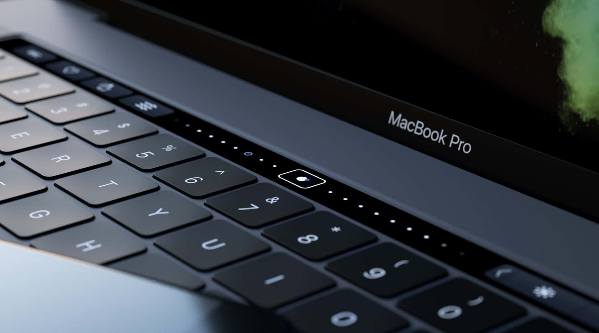 MacBook Pro鍵盤和觸控板的特寫，帶有發光指示燈。