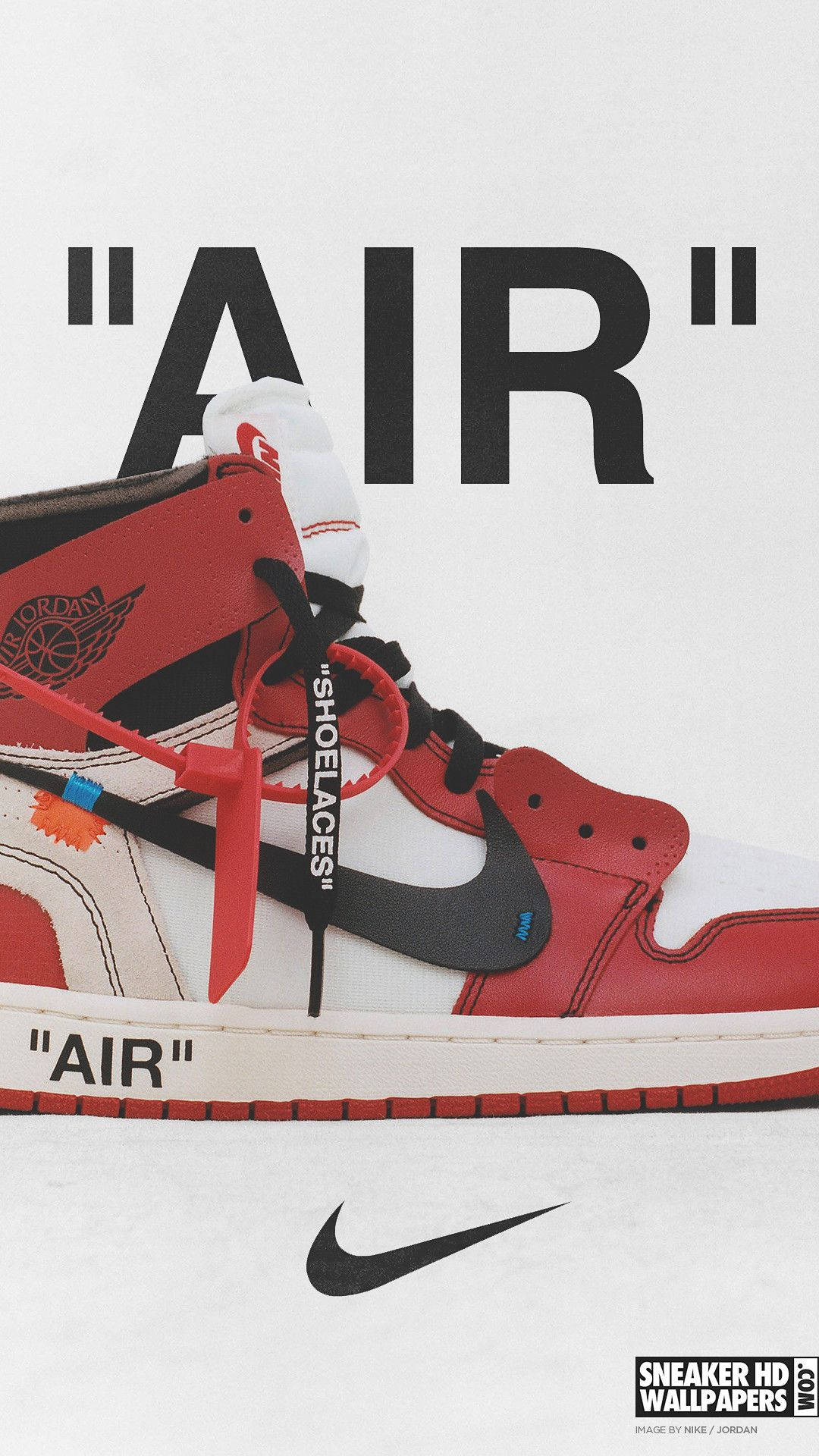 紅白黑 Air Jordan 運動鞋，帶有 Off White 品牌標識和大膽字體。
