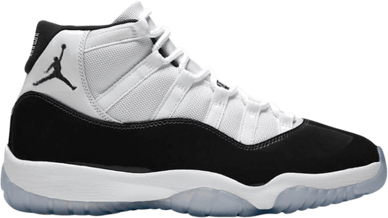 Air Jordan 11 Retro 白黑配色 壁紙 — 一雙完美無瑕的黑白 Air Jordan 11 運動鞋，帶有標誌性的 Jumpman 標誌，展示在乾淨的透明背景上。