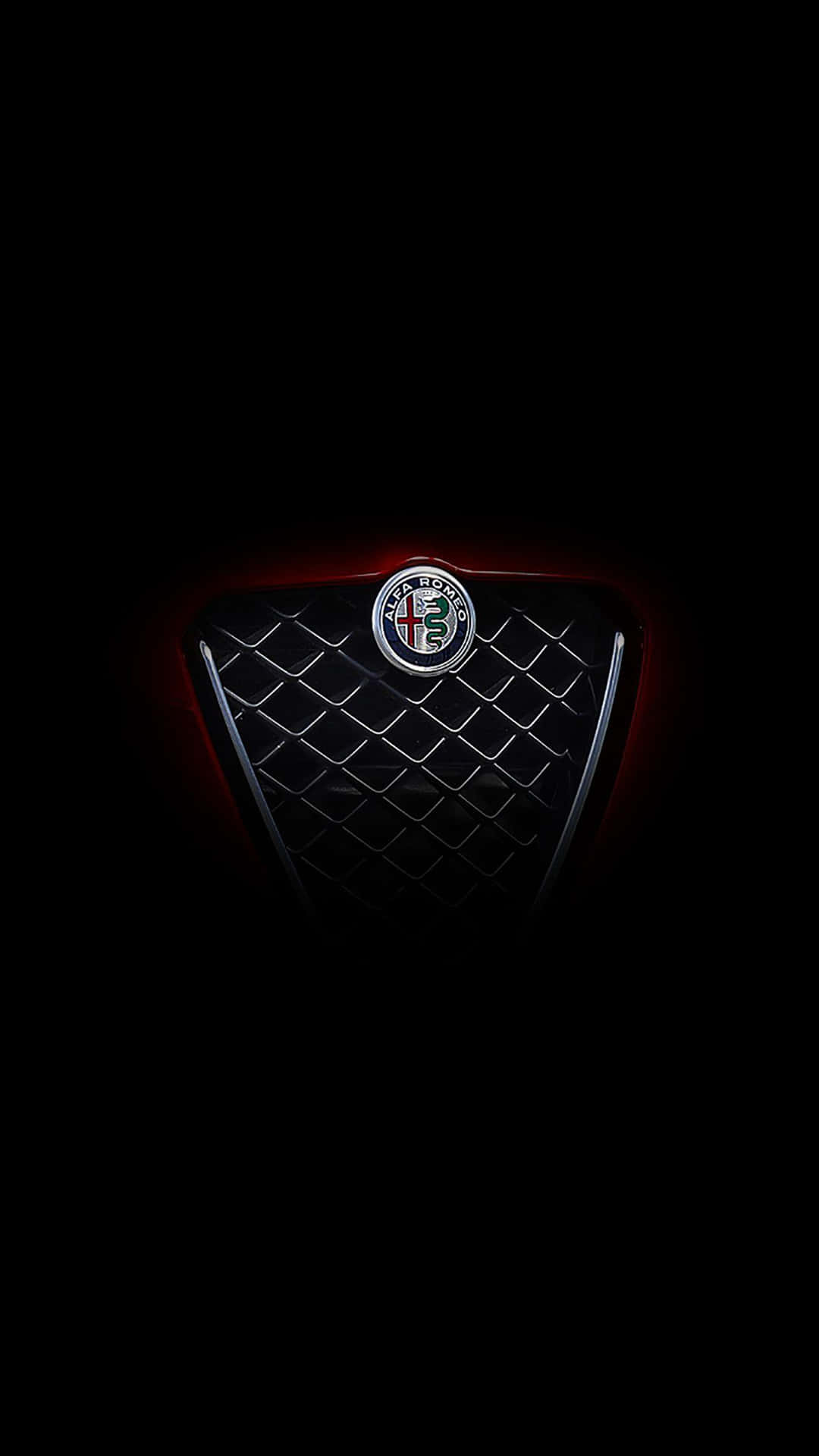 Alfa Romeo 汽車格柵在黑暗背景下帶有紅色照明