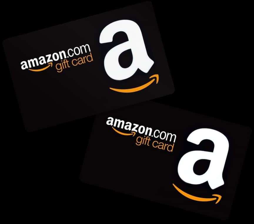 Amazon禮品卡黑色設計 壁紙 — 兩張黑色Amazon禮品卡，帶有白色和橙色標誌，對角放置在深色背景上。