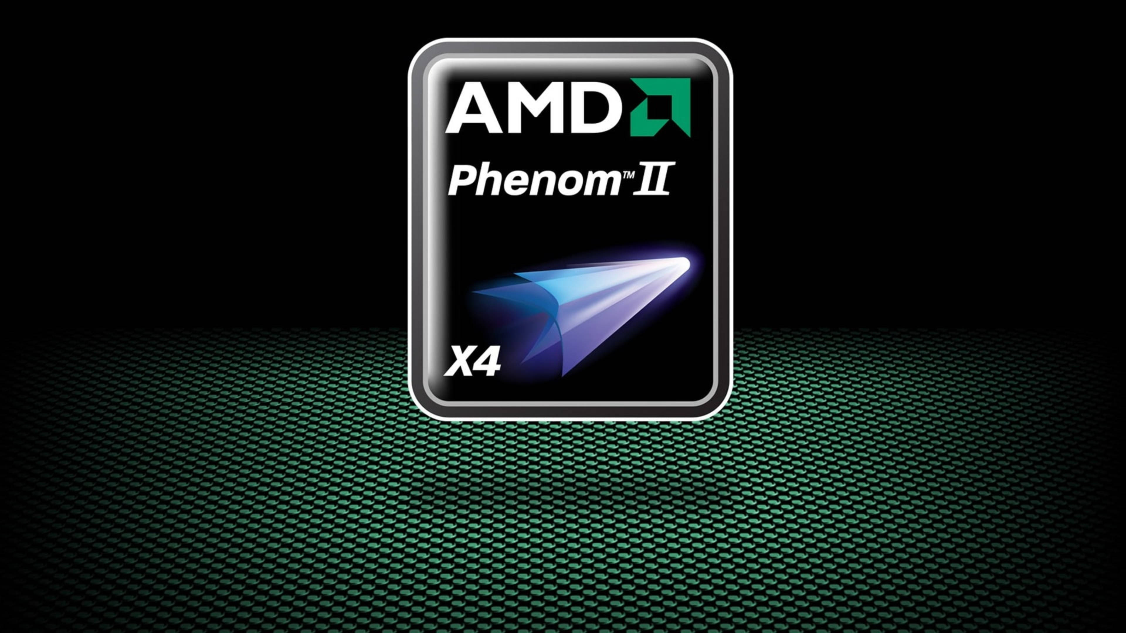 Honeycomb 桌布 壁紙 — AMD Phenom II X4 處理器標誌在深綠色紋理表面上發出藍光。