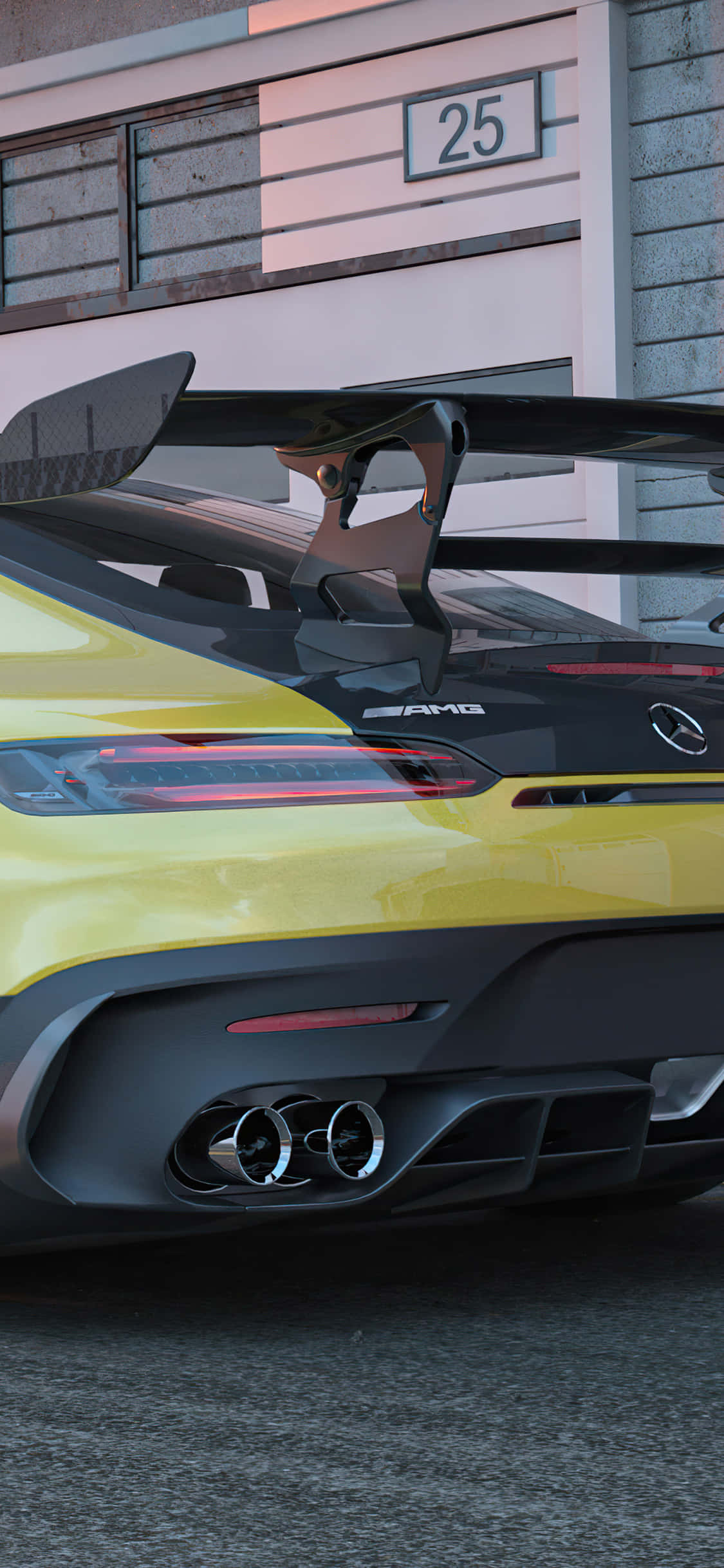AMG GT-R跑車後視圖壁紙 壁紙 — 一輛鮮黃色AMG跑車，帶有大型尾翼和四出排氣管，停泊在標有25號的建築物旁。