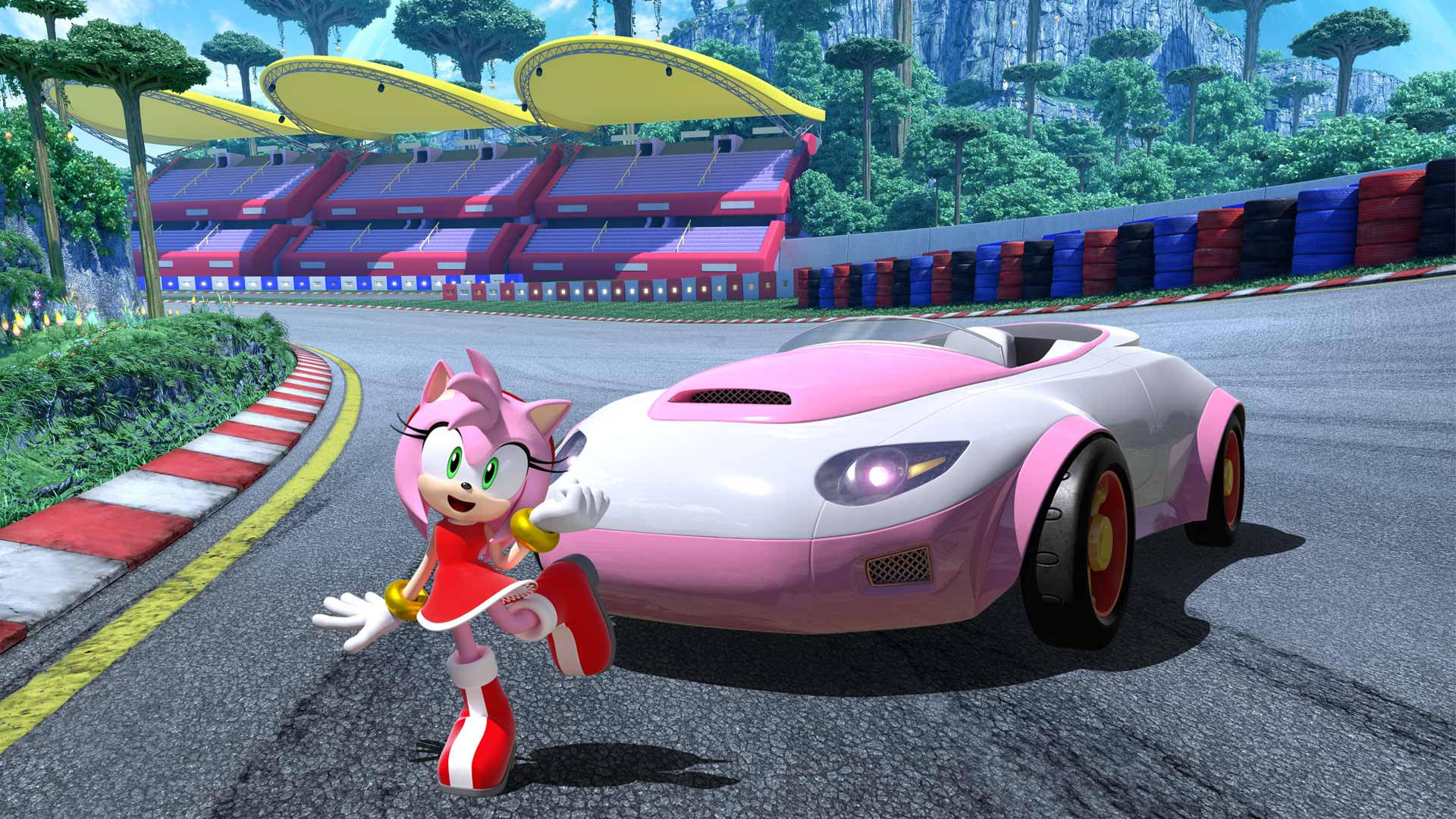 Amy Rose 駕駛粉紅敞篷車 壁紙 — 粉紅色刺蝟艾咪·羅斯穿著紅色連衣裙，在她粉紅色和白色的賽車旁邊奔跑在充滿活力的賽道上。