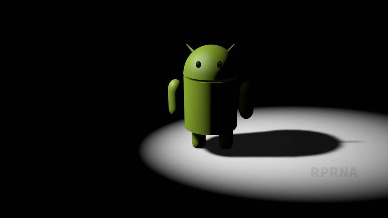 綠色Android機械人在黑暗背景中被聚光燈照亮。