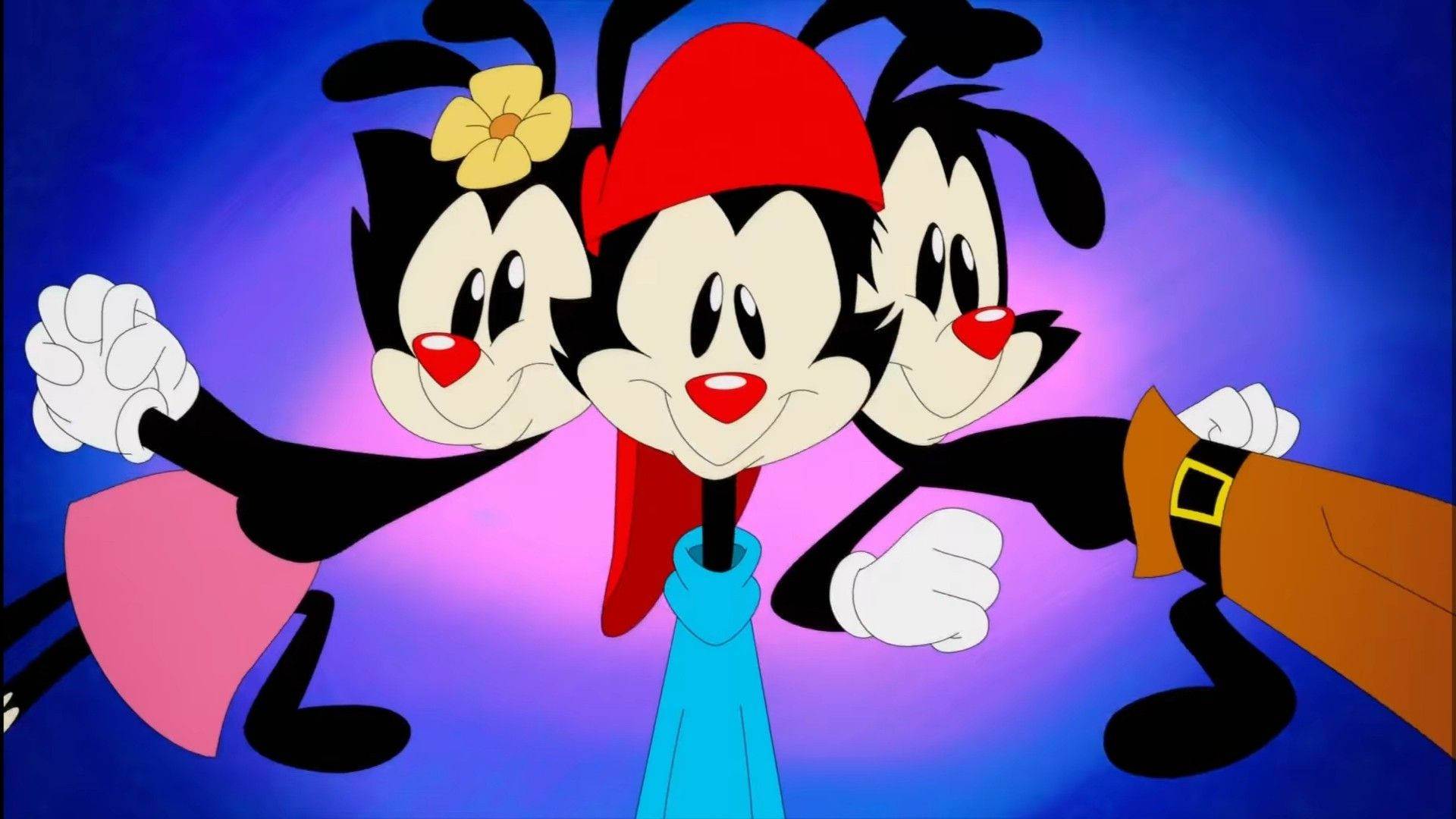 動畫《Animaniacs》華納三胞胎卡通三人組 壁紙 — 三隻卡通貓咪，紅唇黑毛，在發光的紫色和藍色漸變背景前愉快地擺姿勢。