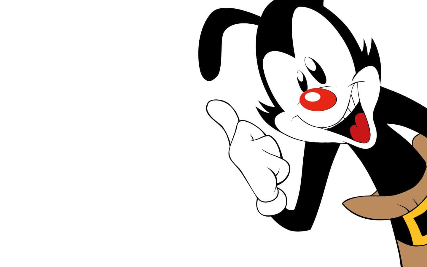 《Animaniacs》三兄妹的經典合照 壁紙 — 一隻黑白毛色、紅鼻子、咧嘴大笑的卡通狗，在純白背景前開心地指著。